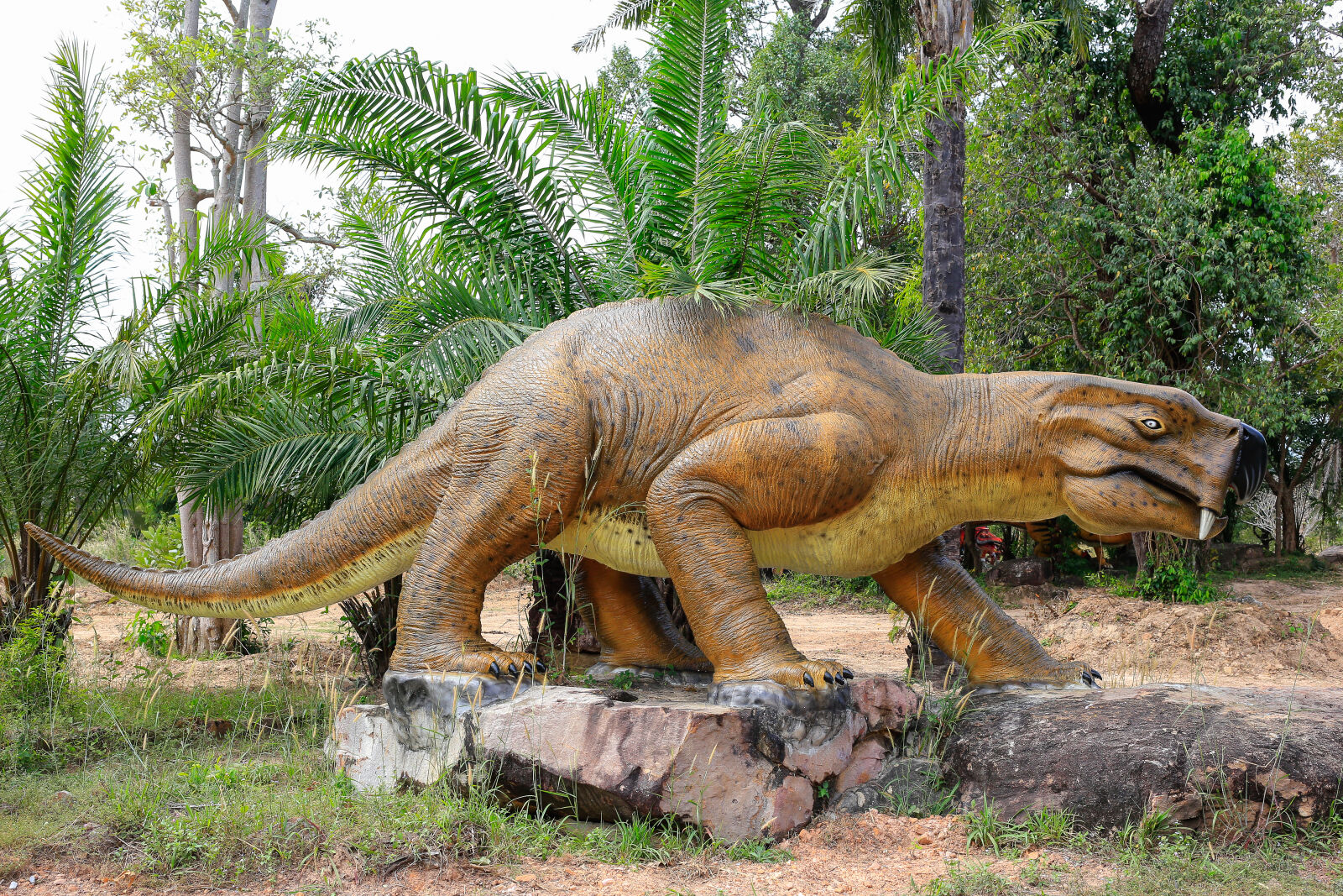 Canon EF 40mm F2.8 STM sample photo. Dinosaur, garden, dinosaur, model photography