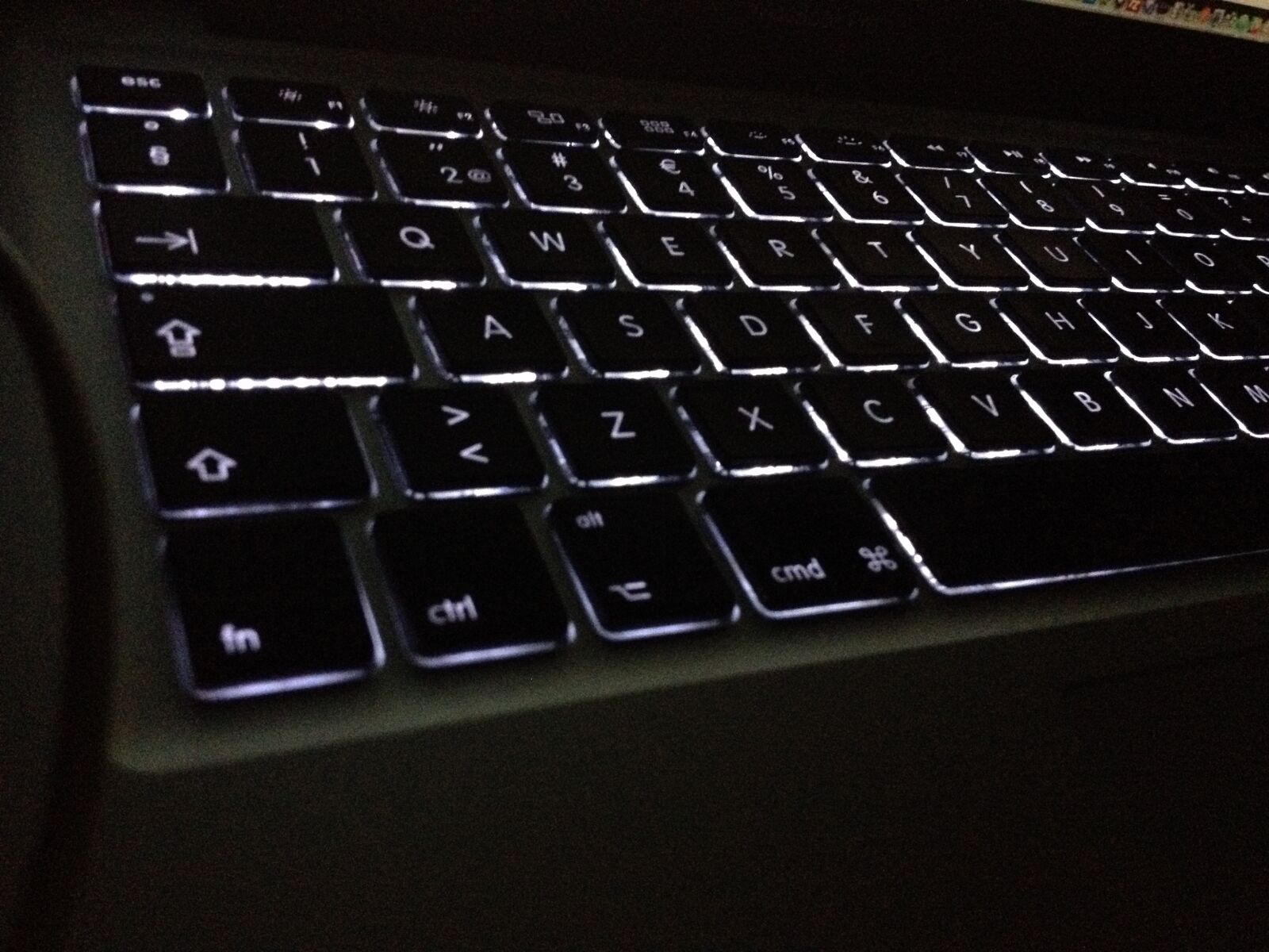 iPhone 4S back camera 4.28mm f/2.4 sample photo. Background, lit, digits, dark photography