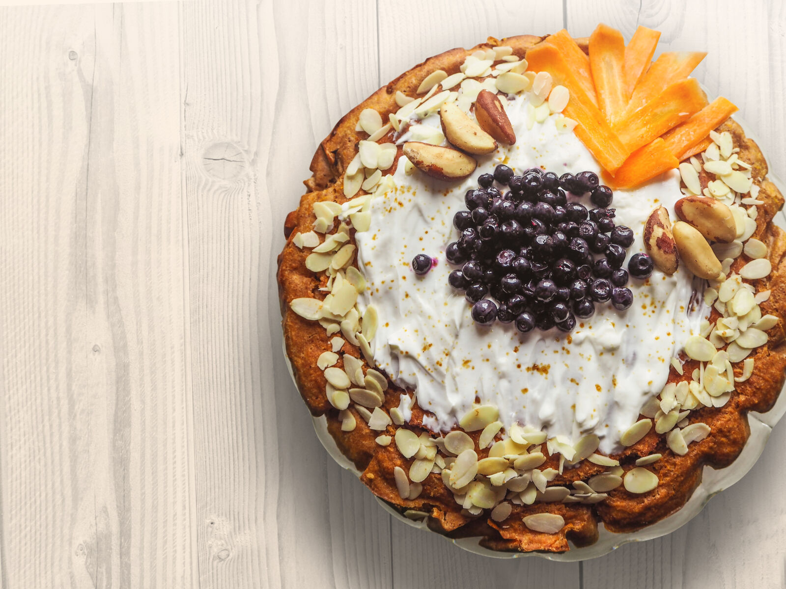 Olympus OM-D E-M10 sample photo. Pastry, with, nuts, sliced photography