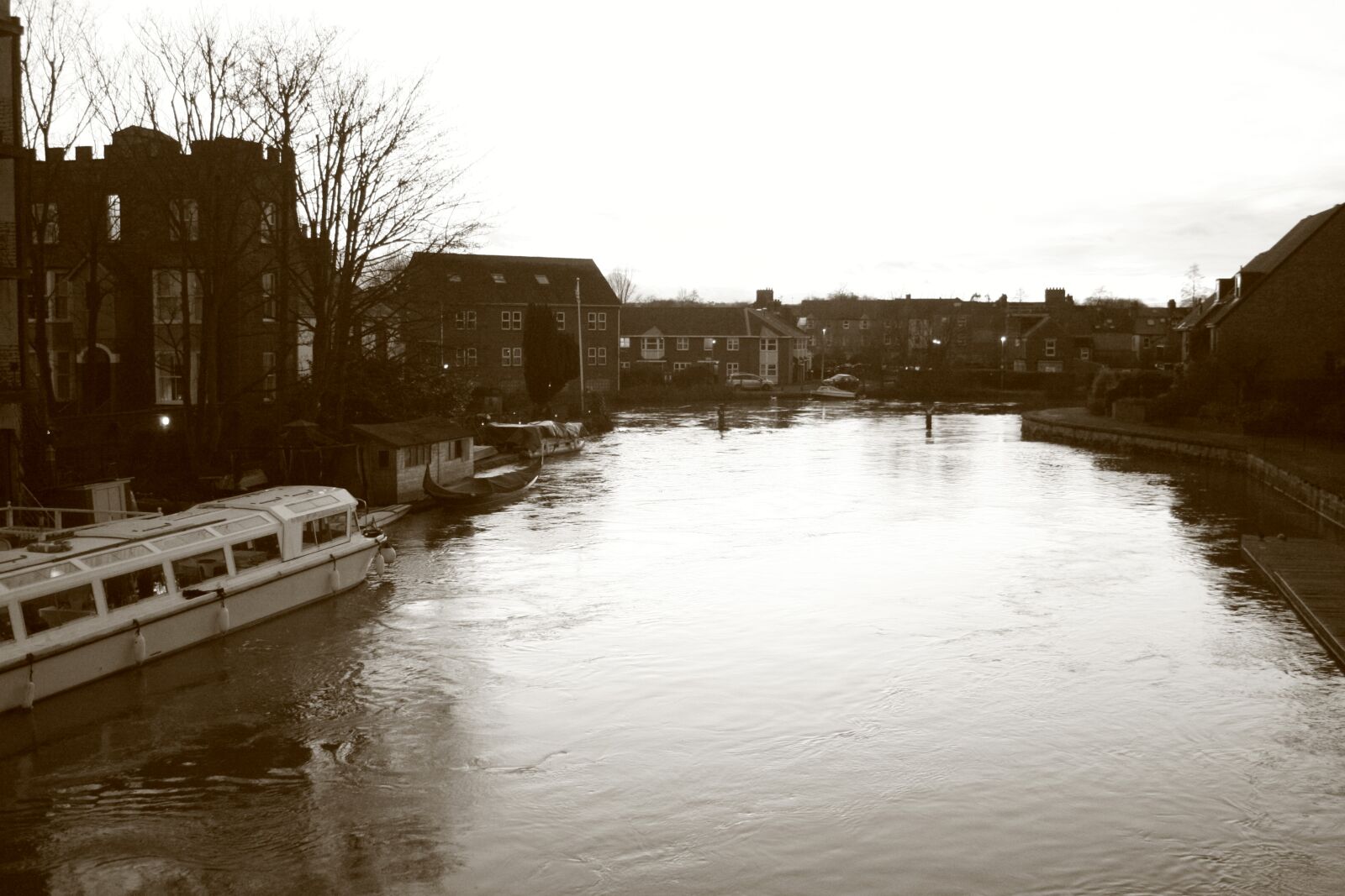 Canon EF-S 18-55mm F3.5-5.6 II sample photo. River, amidst, city, against photography
