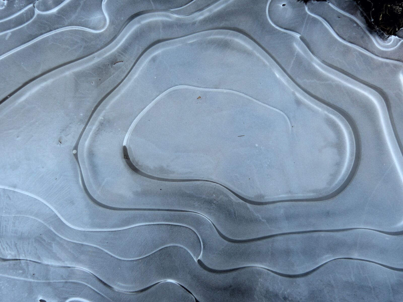 Panasonic Lumix DMC-FZ150 sample photo. Ice, puddle, spiral photography
