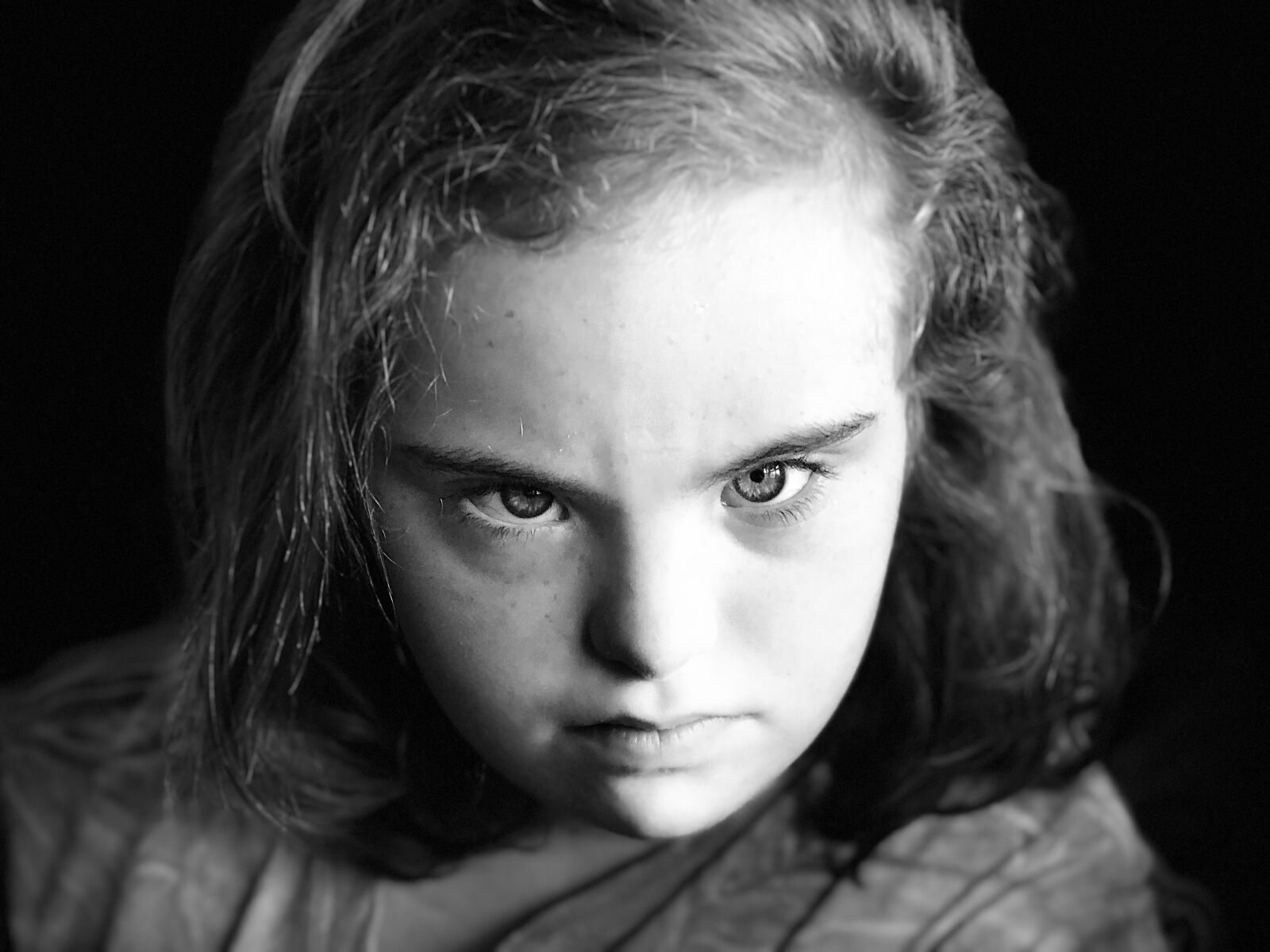 iPhone X back dual camera 6mm f/2.4 sample photo. Down syndrome, girl, jill photography