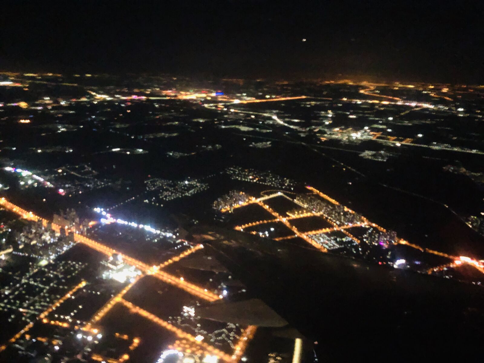 iPhone X back dual camera 4mm f/1.8 sample photo. Night view, aircraft, height photography