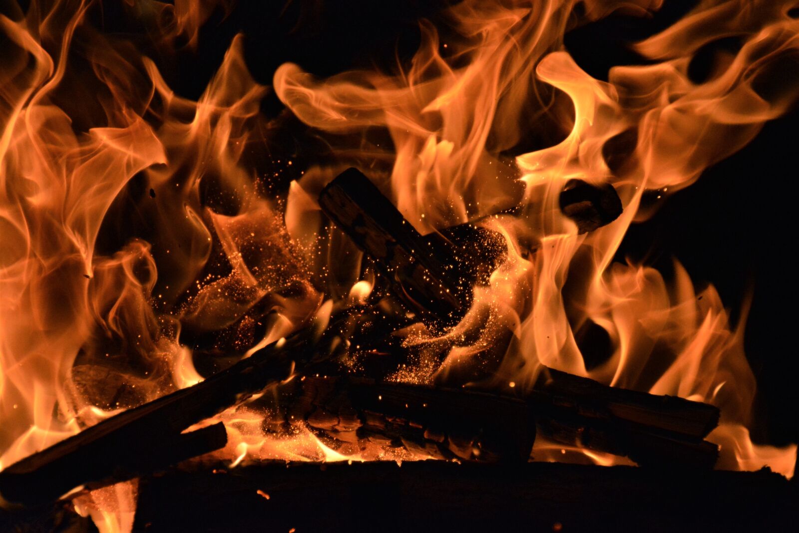 Nikon D5200 sample photo. Fire, spark, wood photography