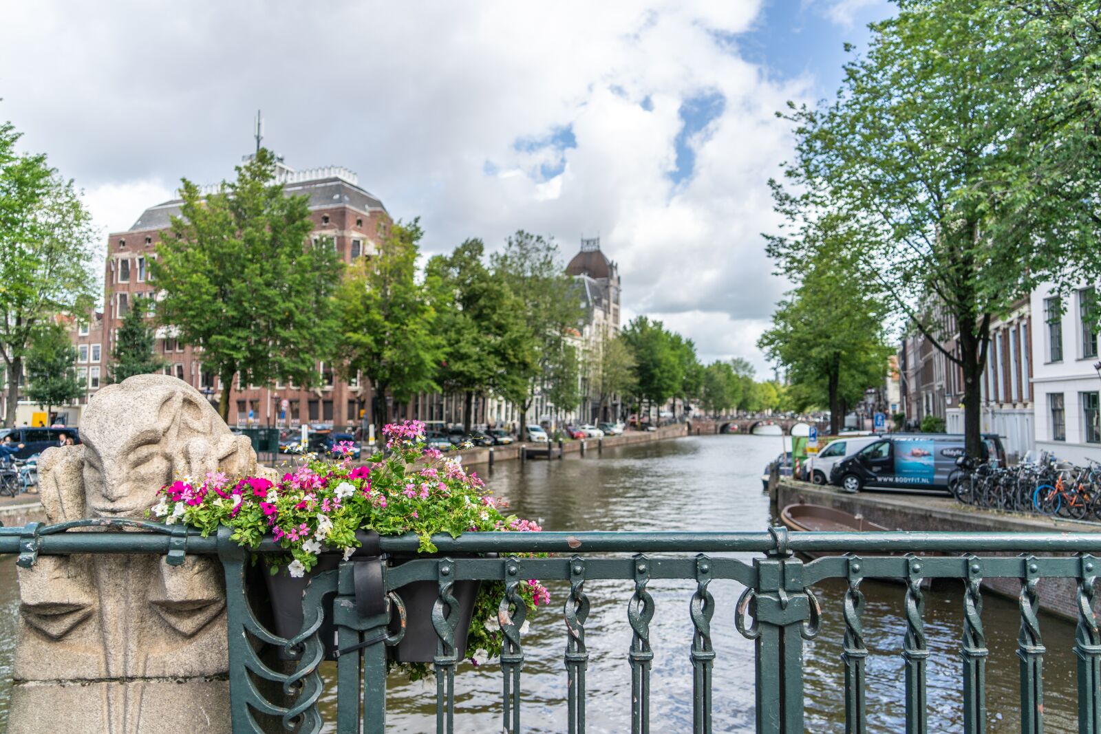 Sony a7R II + Sony FE 24-240mm F3.5-6.3 OSS sample photo. Amsterdam, canal, flowers photography