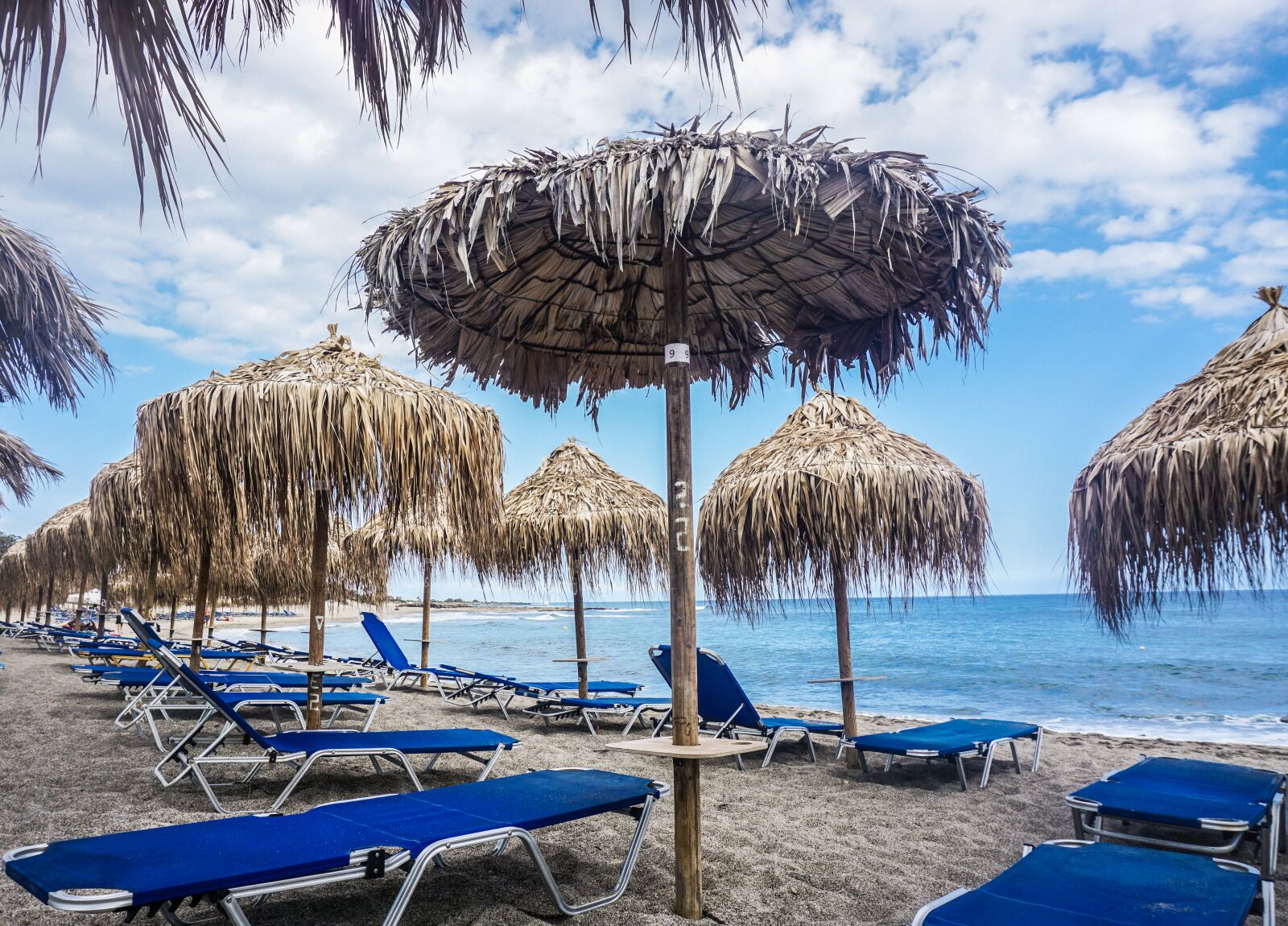 Sony a6000 sample photo. Vacations, sea, sun chair photography