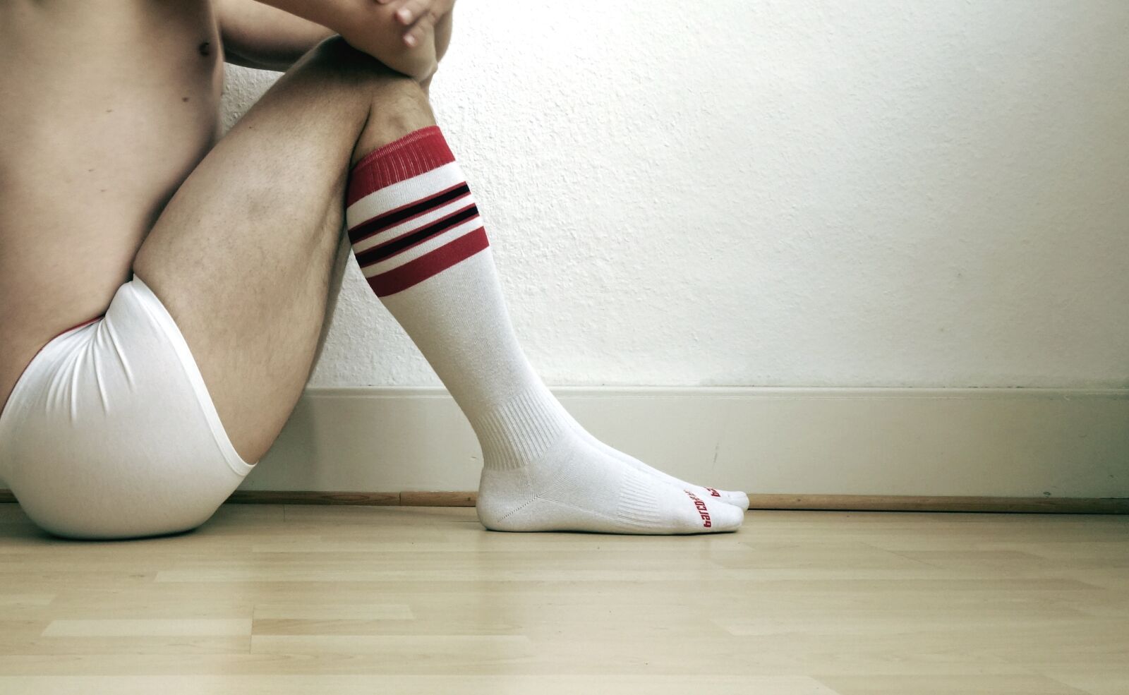 Sony Cyber-shot DSC-RX100 sample photo. Wall, white, socks photography