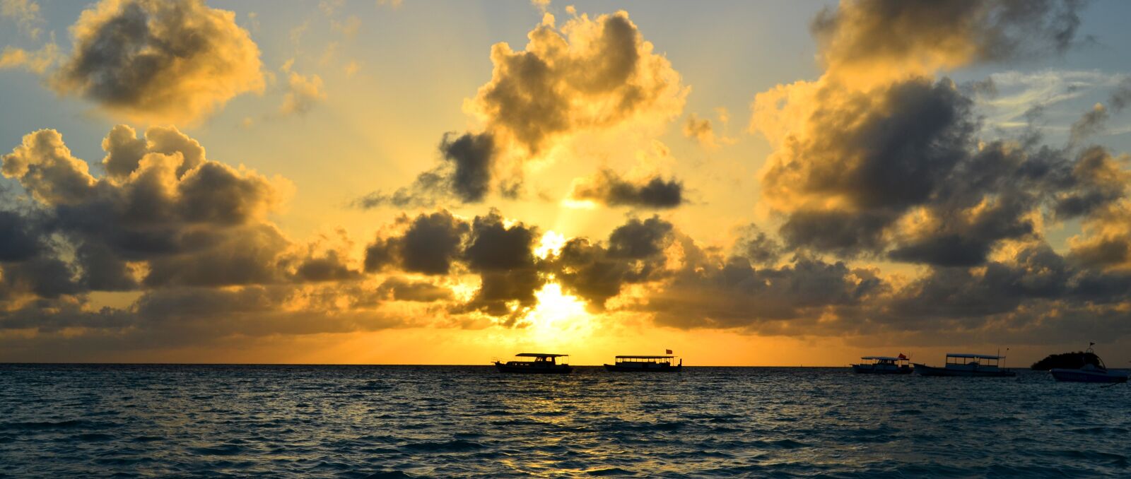 Nikon D5100 sample photo. Sunset, water, sun photography