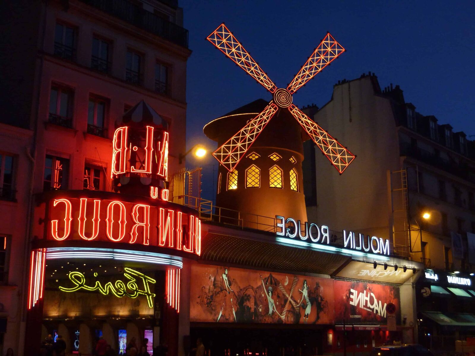 Panasonic DMC-TZ7 sample photo. Windmill, downtown, city, advertisement photography
