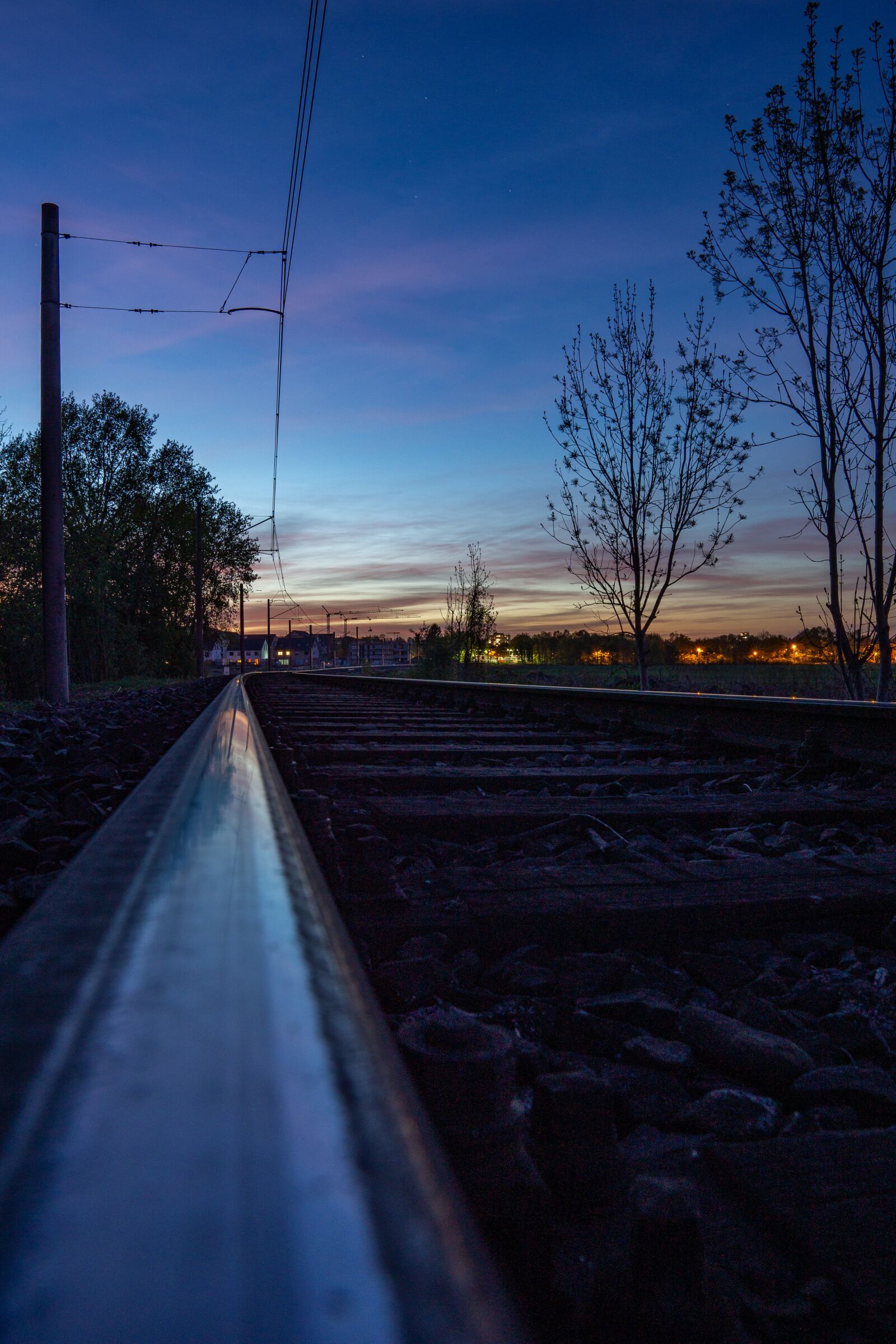 Sigma 16mm F1.4 DC DN | C sample photo. Rails, sunset, train photography