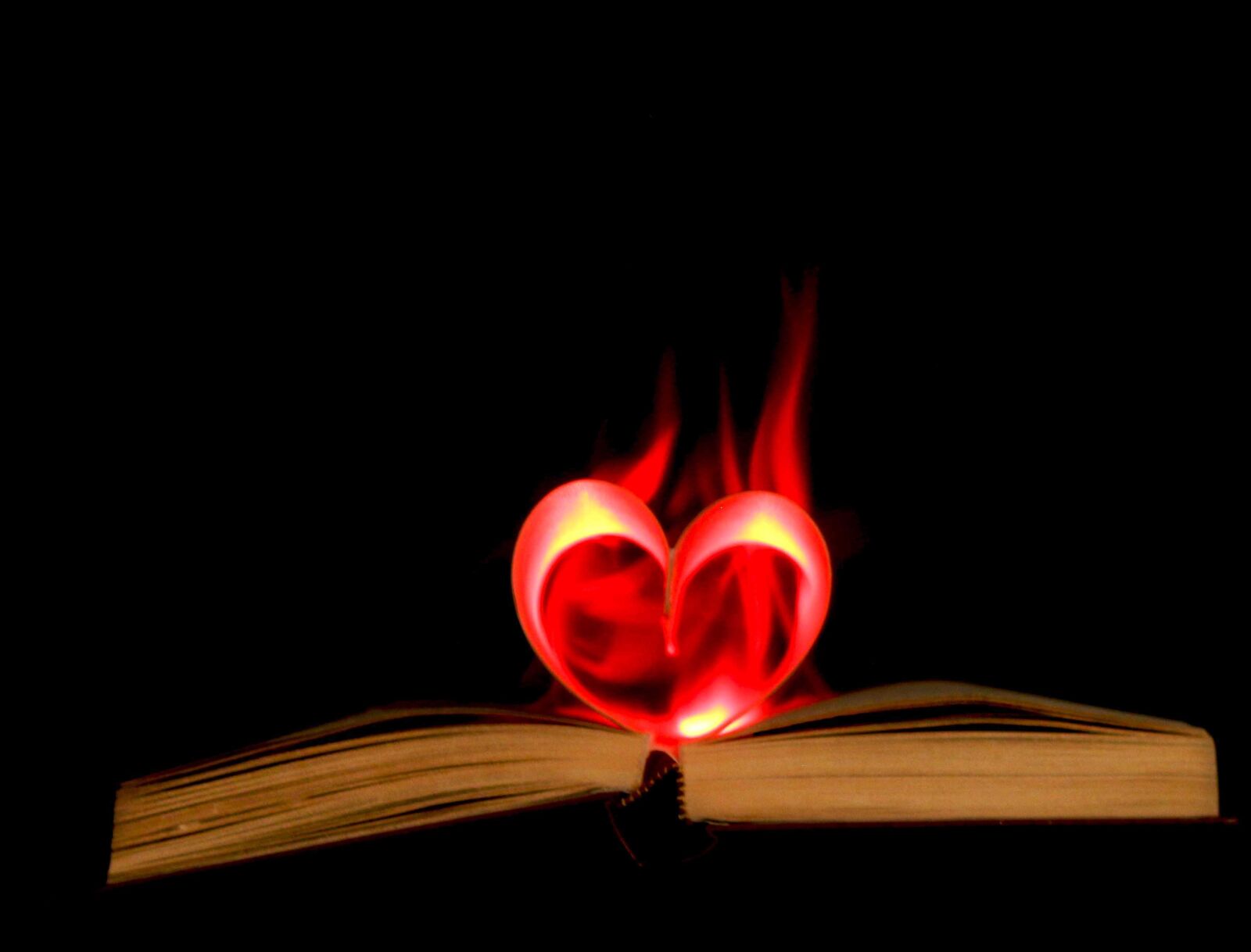 Canon EF-S 18-55mm F3.5-5.6 IS sample photo. Book, flame, heart photography