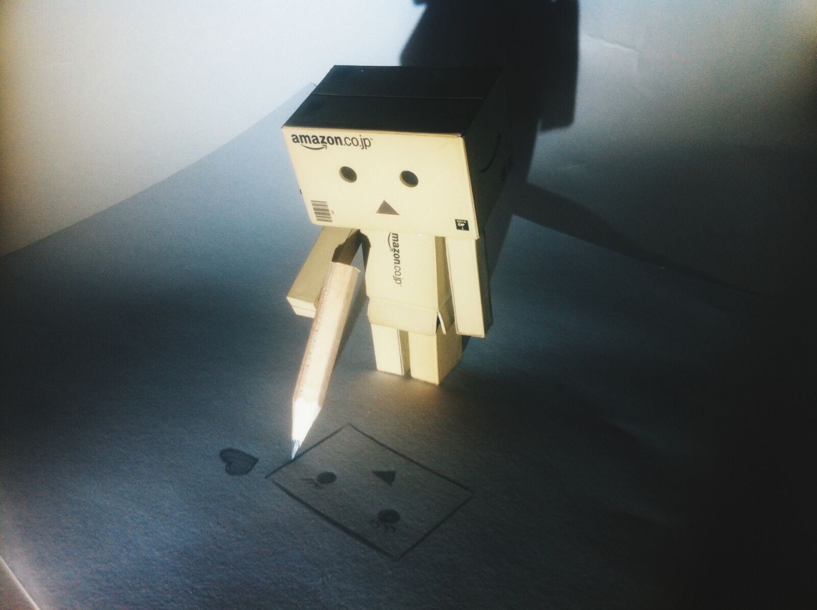 iPhone 4 back camera 3.85mm f/2.8 sample photo. Boy, danbo, danboard, drawing photography