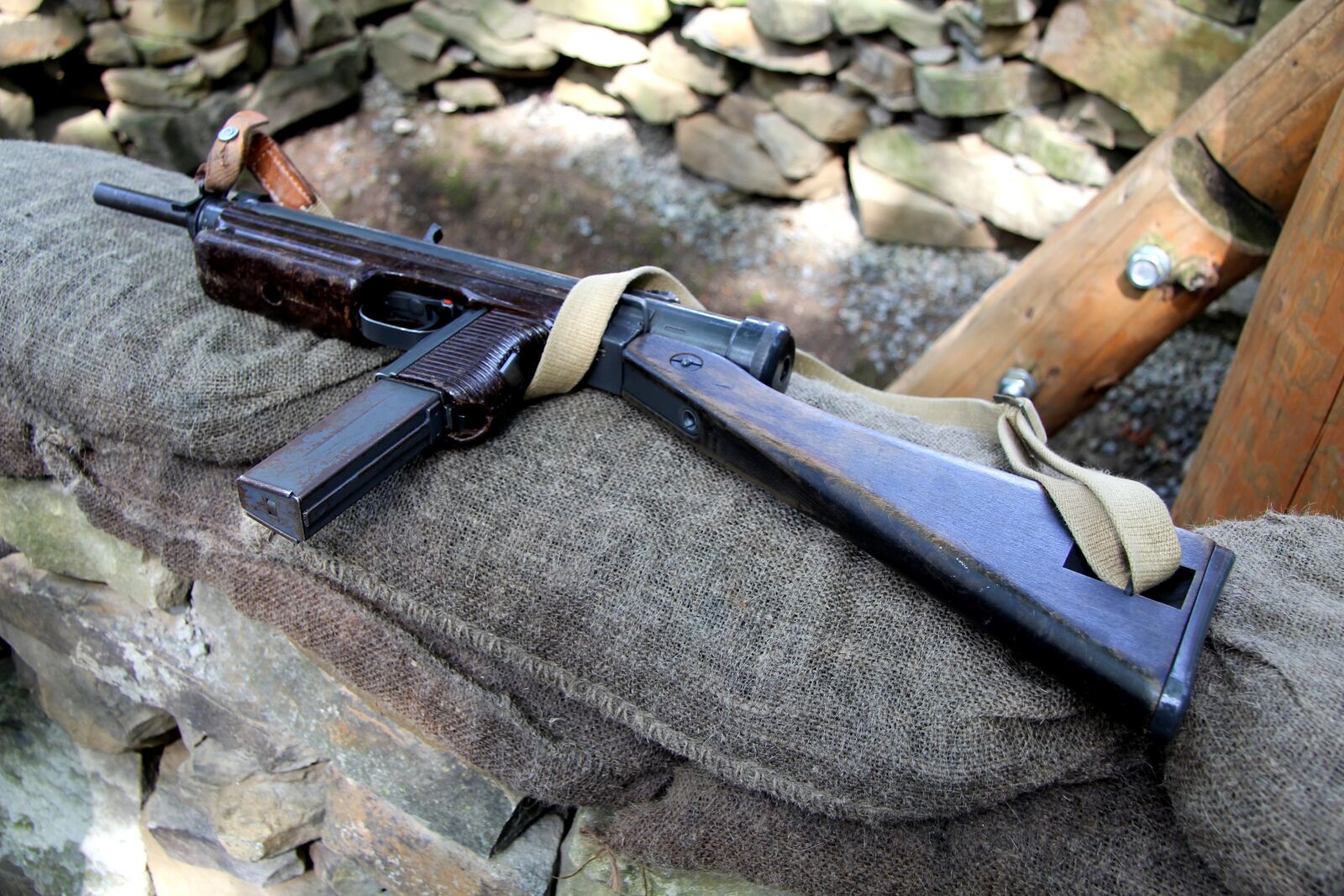 Canon EF-S 17-85mm F4-5.6 IS USM sample photo. Submachine gun, weapon, war photography