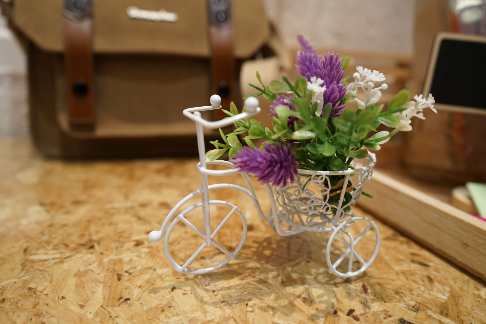 Sony a7 II + Sony FE 28-70mm F3.5-5.6 OSS sample photo. Bike tiny, restaurant, comfortable photography