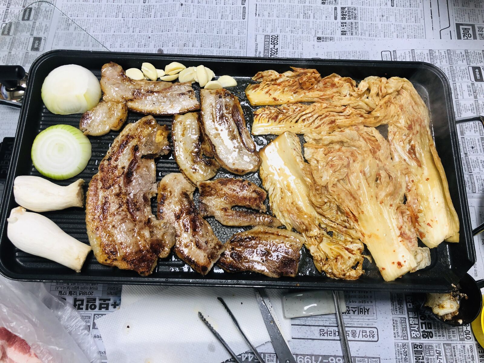 iPhone X back dual camera 4mm f/1.8 sample photo. Pork, grill, onion photography
