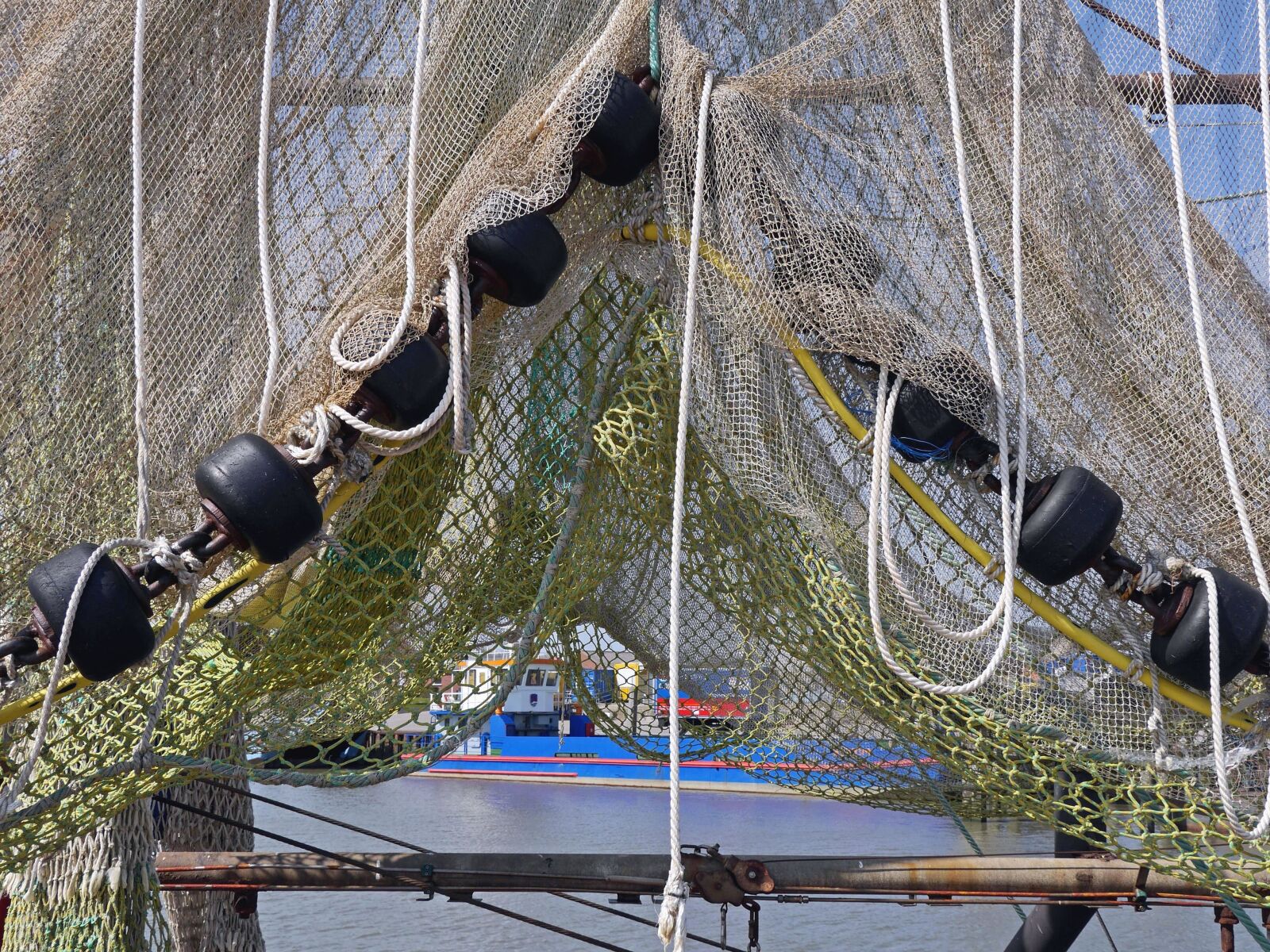Panasonic Lumix DMC-GH3 sample photo. Net, boat, fisherman, sea photography