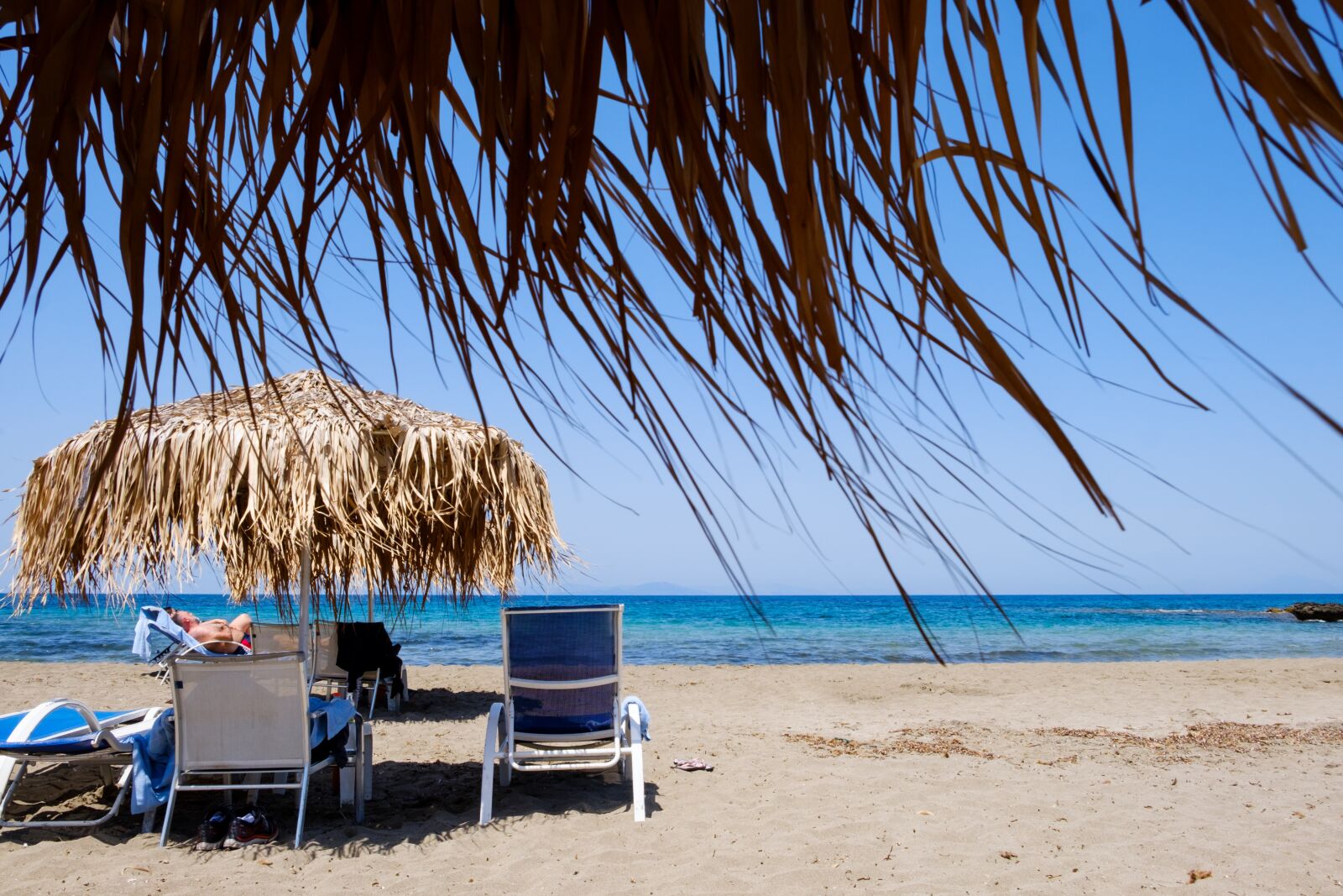 Fujifilm XF 18-55mm F2.8-4 R LM OIS sample photo. Beach, water, parasol photography