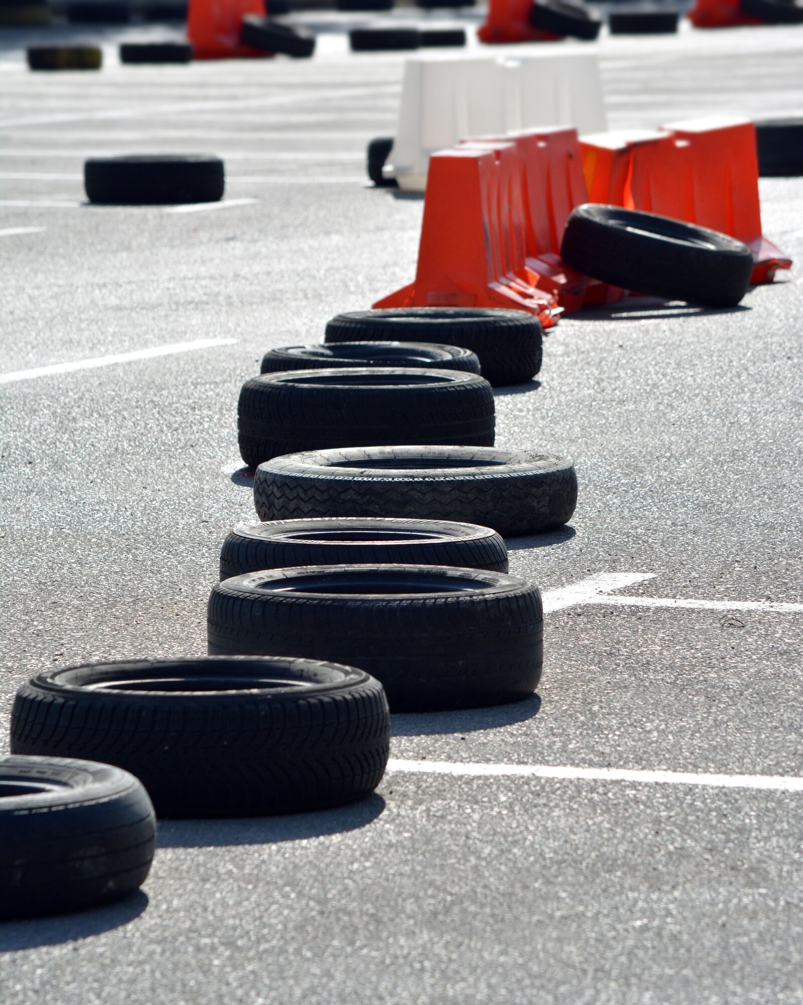 Nikon D5200 sample photo. Race track, old tyres photography