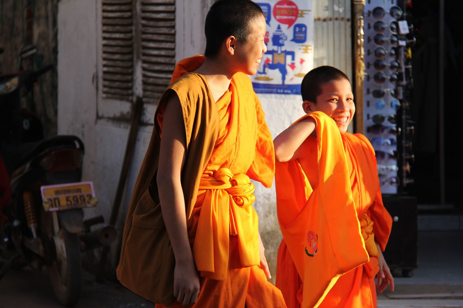 Canon EF-S 18-200mm F3.5-5.6 IS sample photo. Monks, walking, luang prabang photography