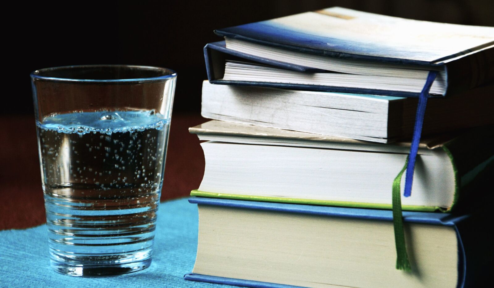 Nikon D5200 sample photo. Glass, water, book, learning photography