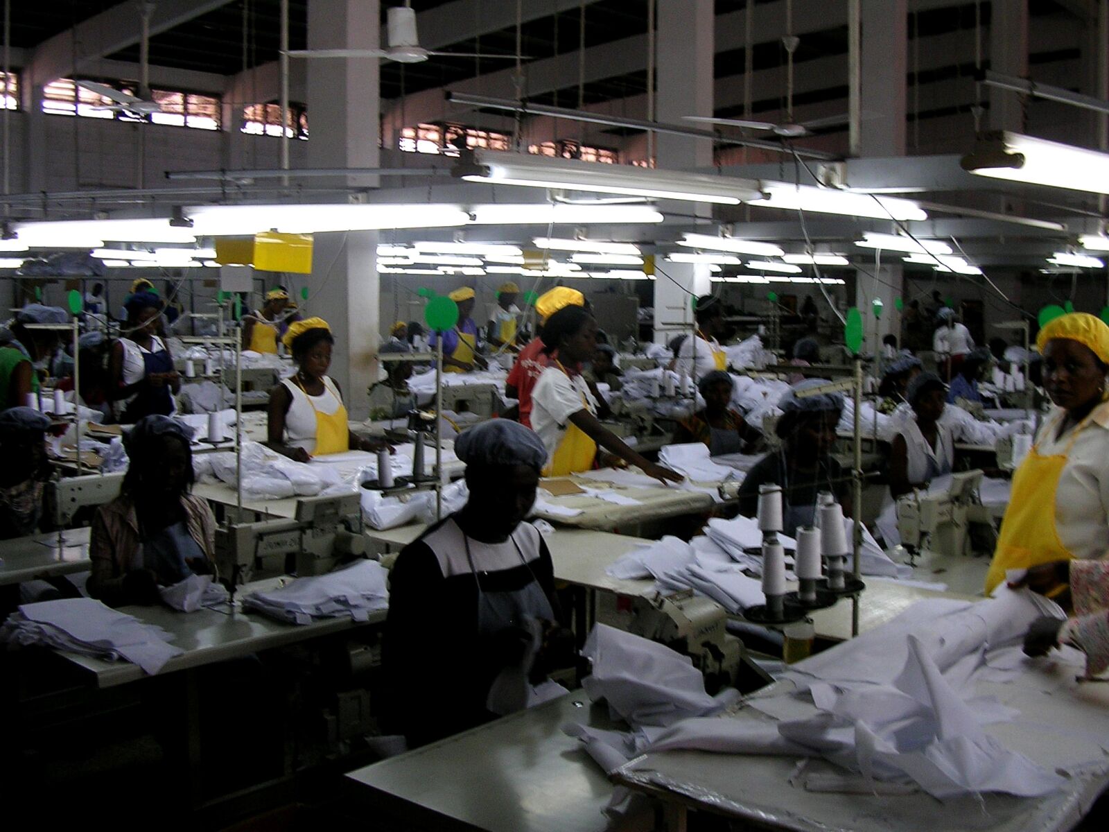 Nikon E3200 sample photo. Ghana, female, workers, factory photography