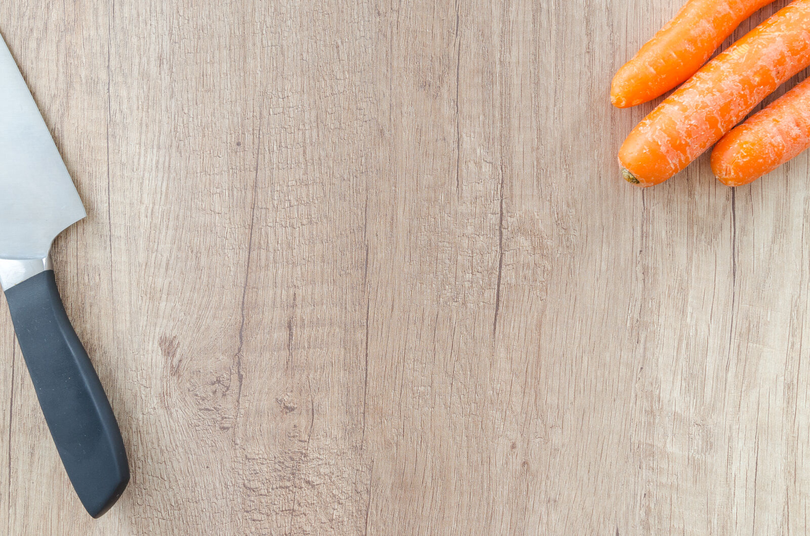 Nikon D5100 sample photo. Above, background, board, carrot photography
