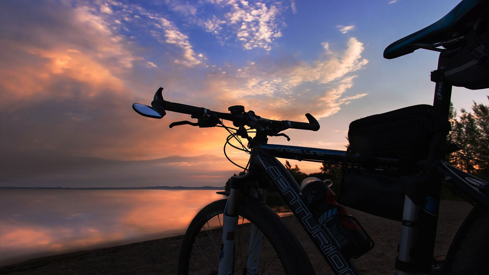 Canon EOS 550D (EOS Rebel T2i / EOS Kiss X4) sample photo. Sunset, bike, beach photography