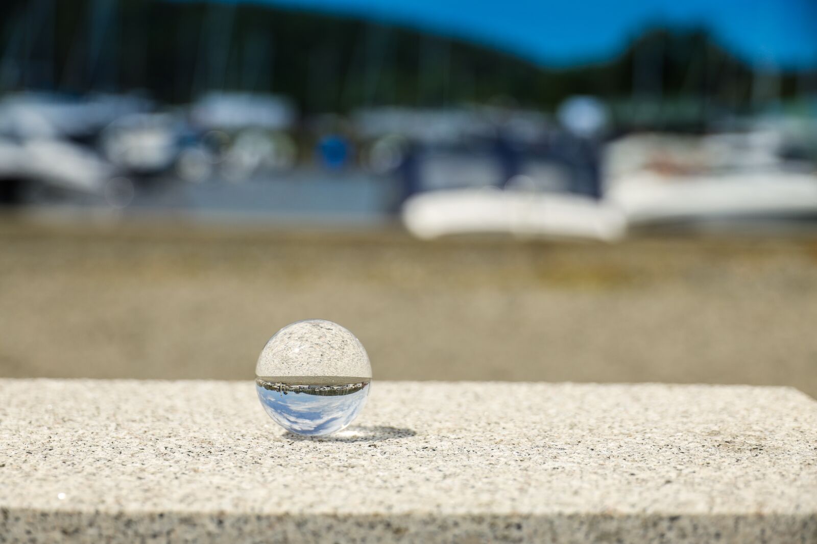 Canon RF 24-240mm F4-6.3 IS USM sample photo. Marble, reflection, dock photography