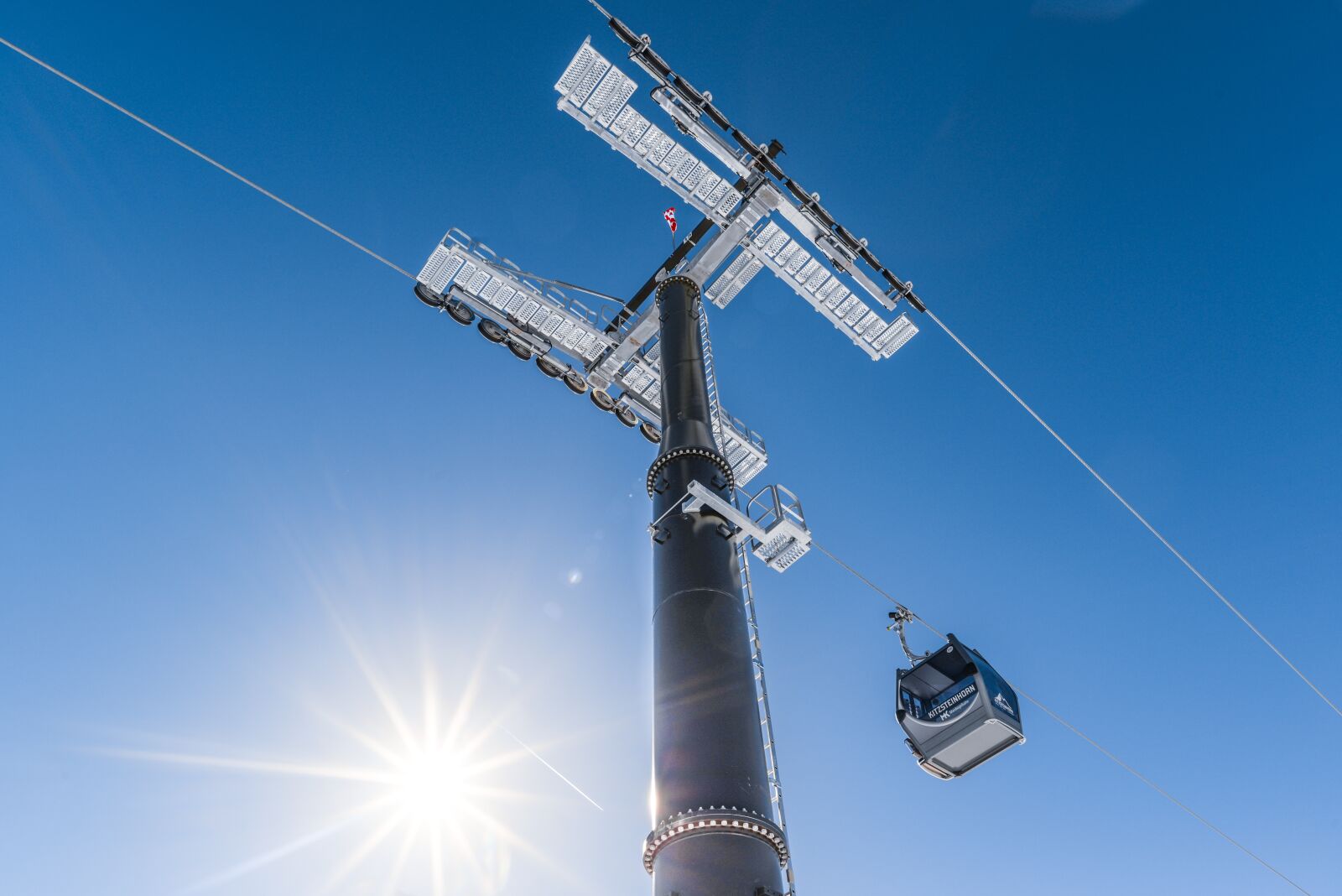 Nikon D610 sample photo. Ski lift, sunstar, blue photography