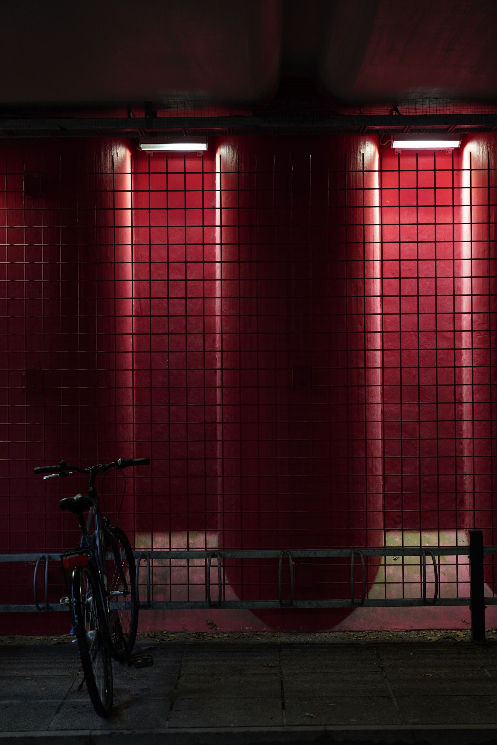 Sony a7R III sample photo. Red bicycle parking photography