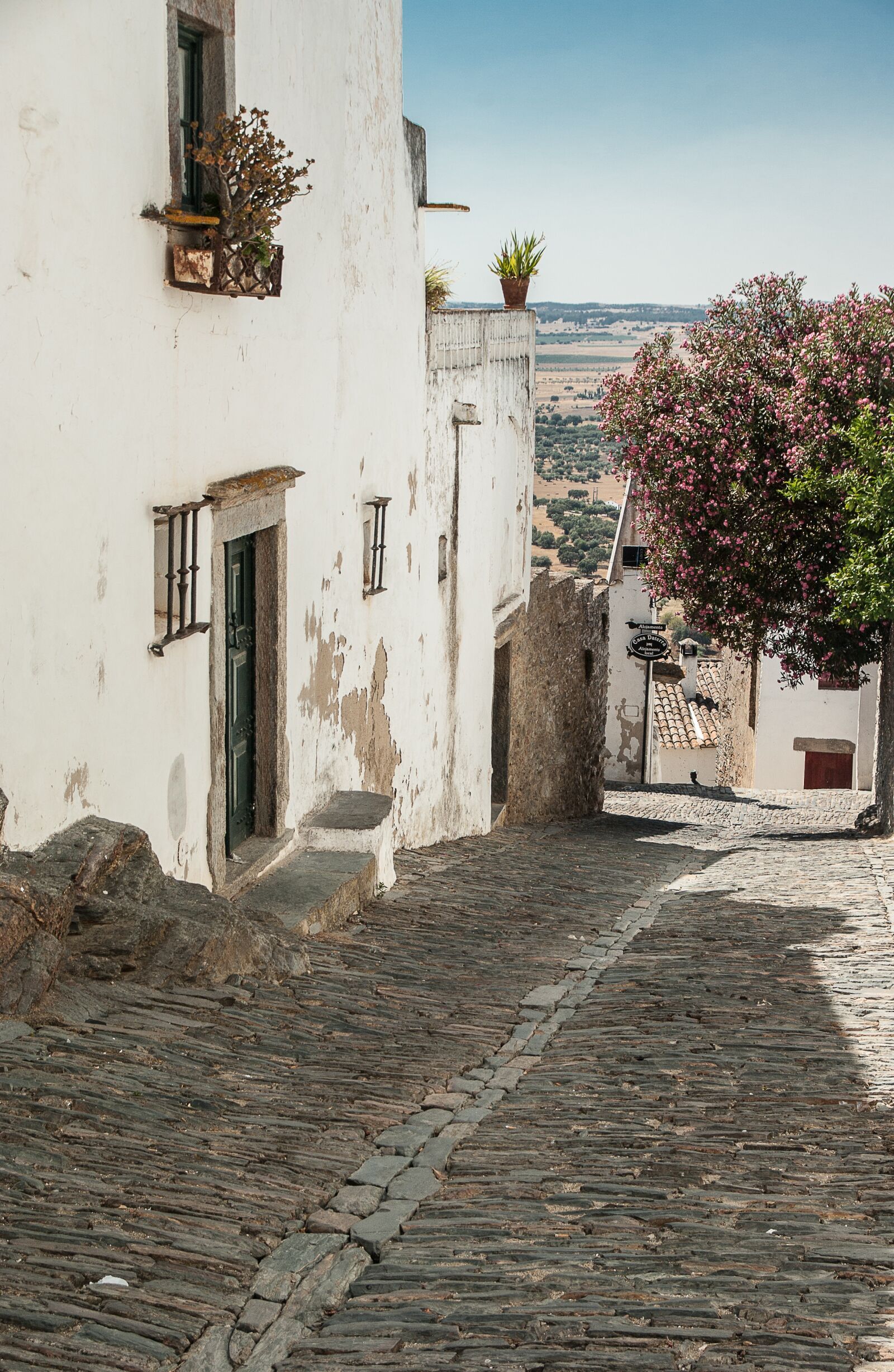 Pentax K10D sample photo. Portugal, streets, pavers photography