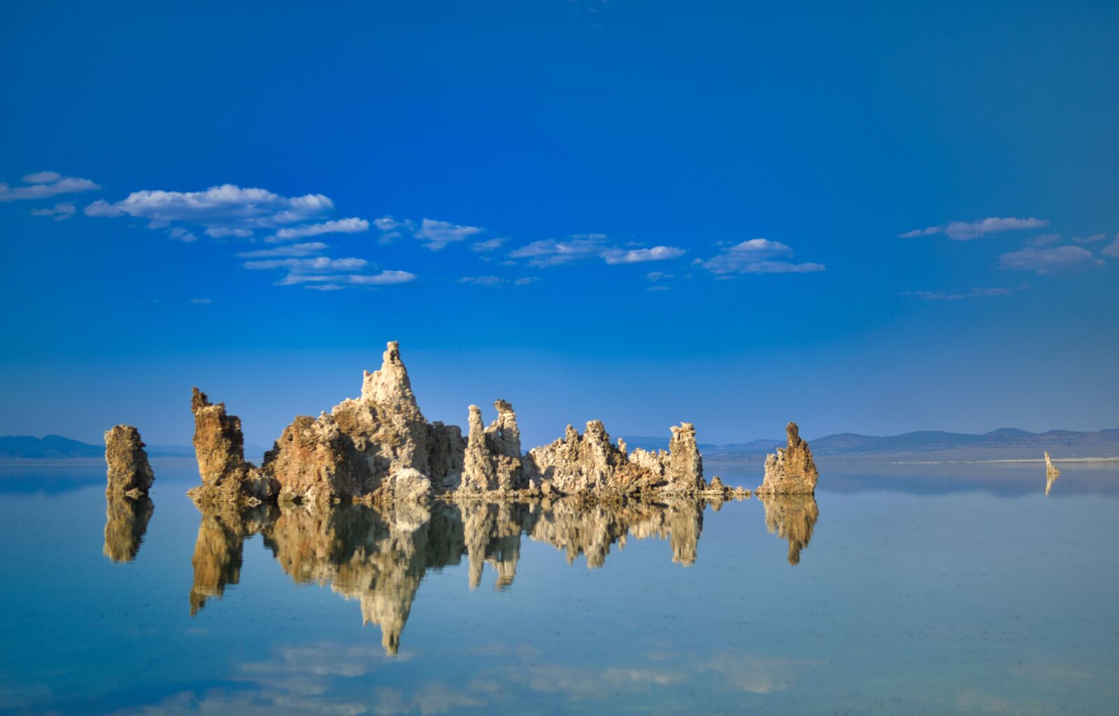 Nikon Df sample photo. Rocks, lake, clear photography