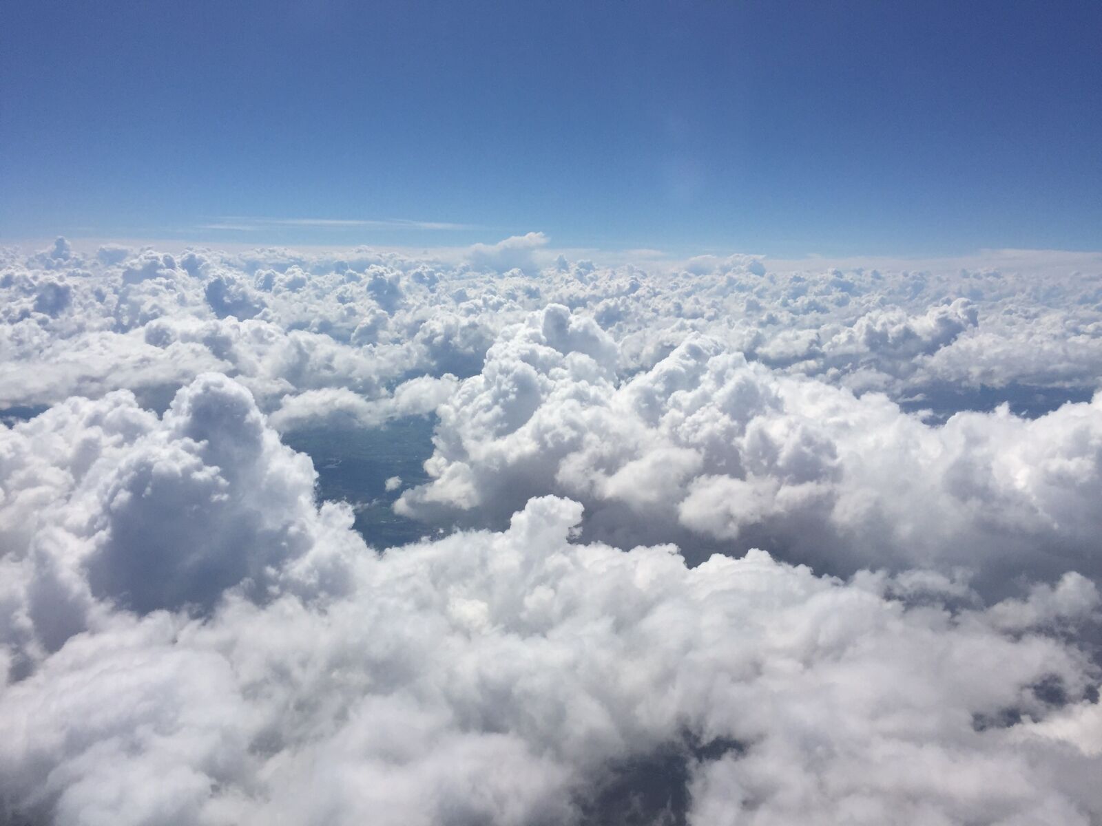 Apple iPhone 6 sample photo. Clouds, formations, plane photography