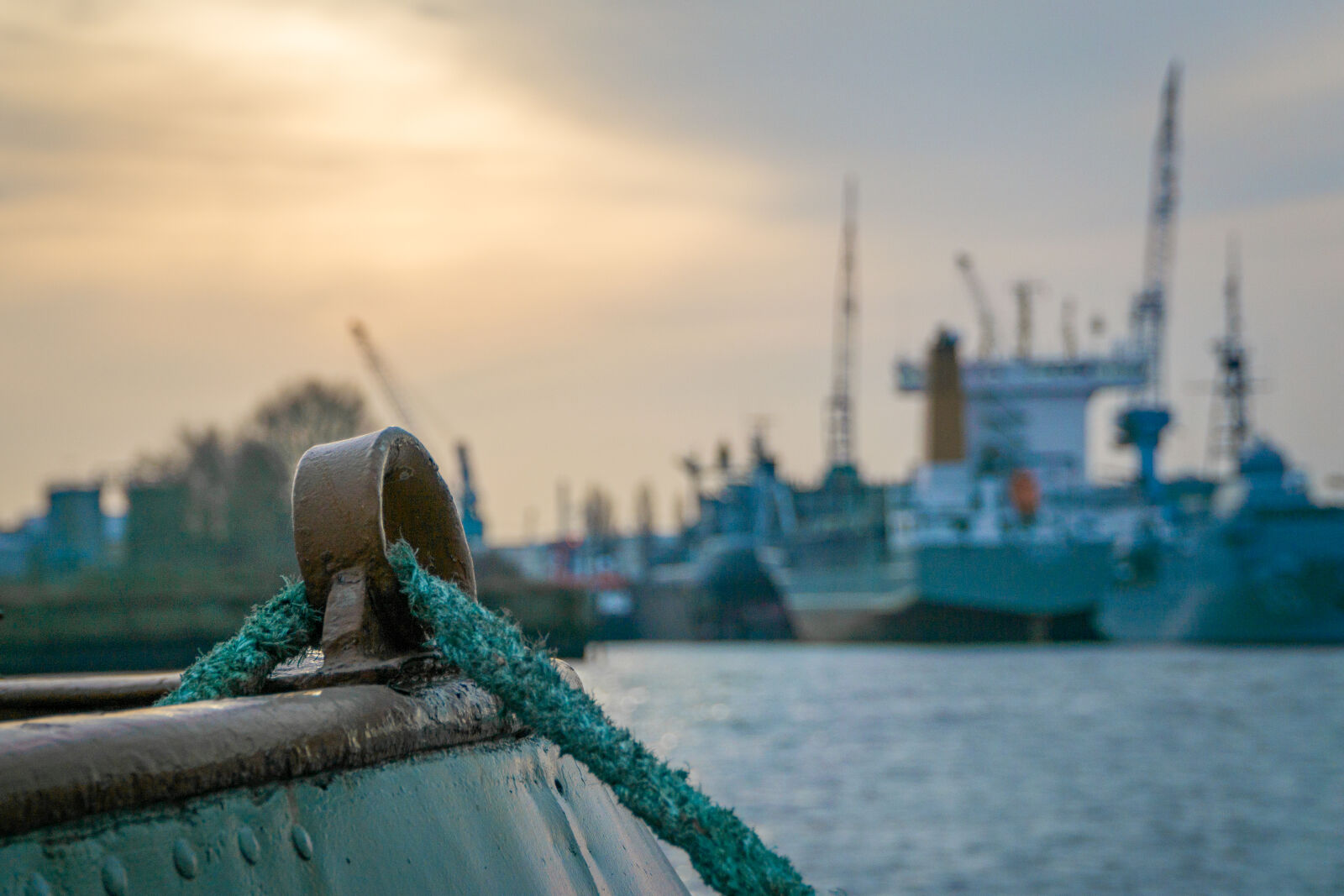 Sony a6000 + Sony E PZ 18-105mm F4 G OSS sample photo. Bridge, cargo, coast, cranes photography