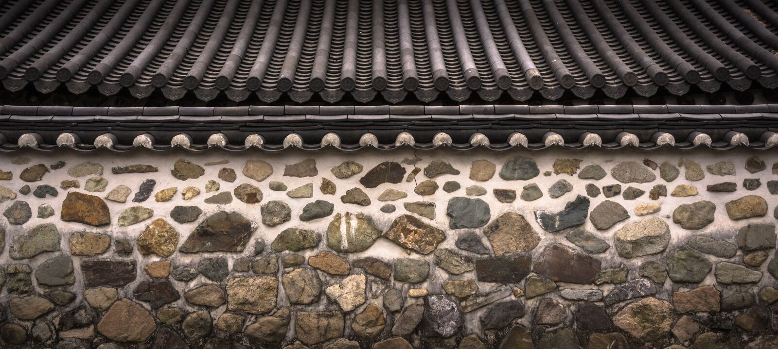 Sony Alpha NEX-5N sample photo. Roof tile, stone wall photography