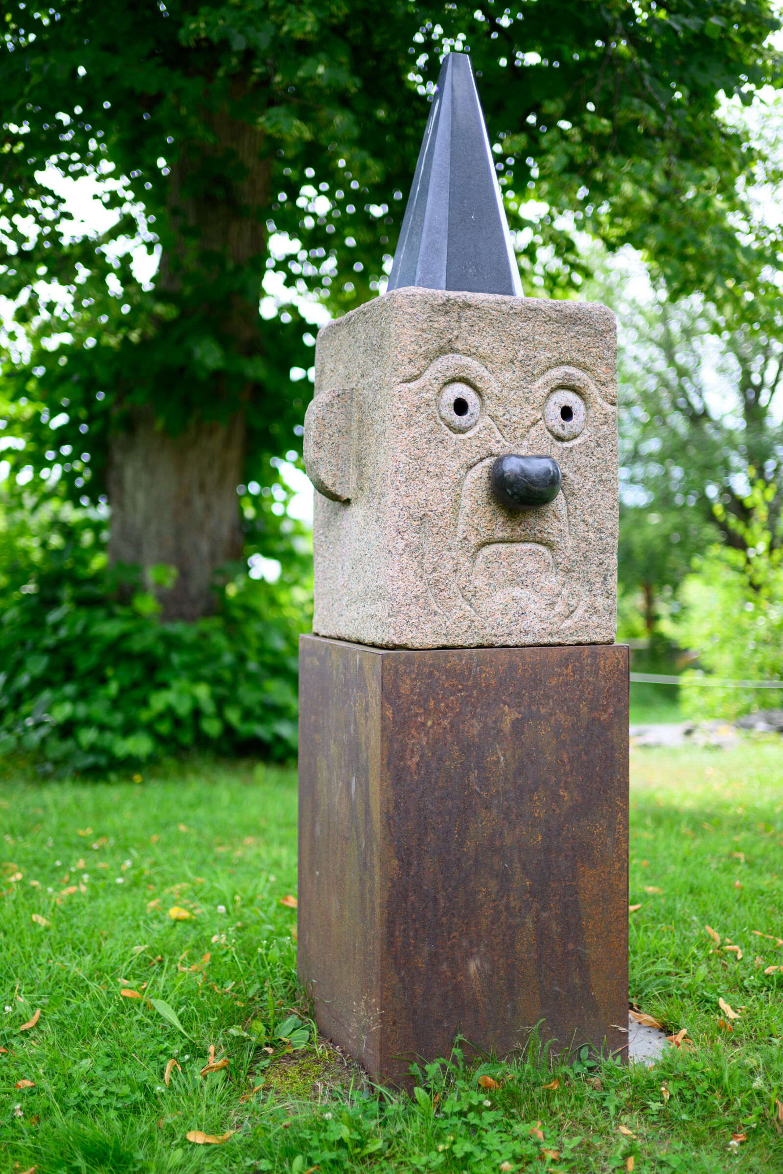 Nikon Nikkor Z 35mm F1.4 sample photo. Unhappy statue photography