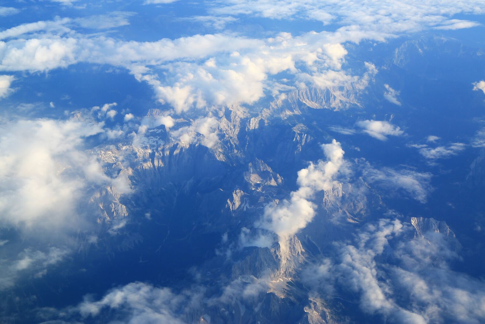 Canon EF 24-105mm F4L IS USM sample photo. Mountains, clouds, snow photography