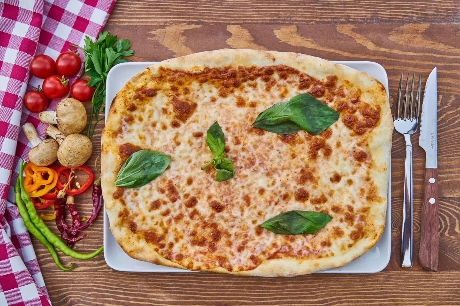 Sony a7R II sample photo. Pizza, table, pepper photography