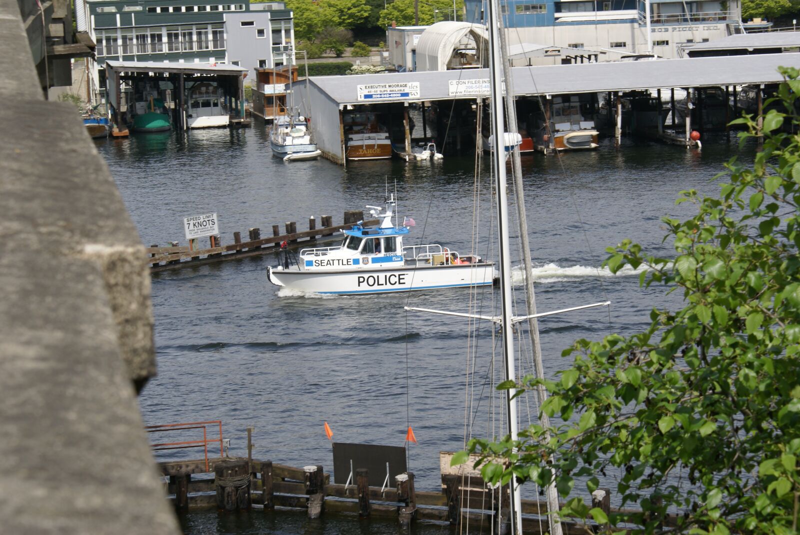 Sony Alpha DSLR-A100 sample photo. Boat, police, canal photography