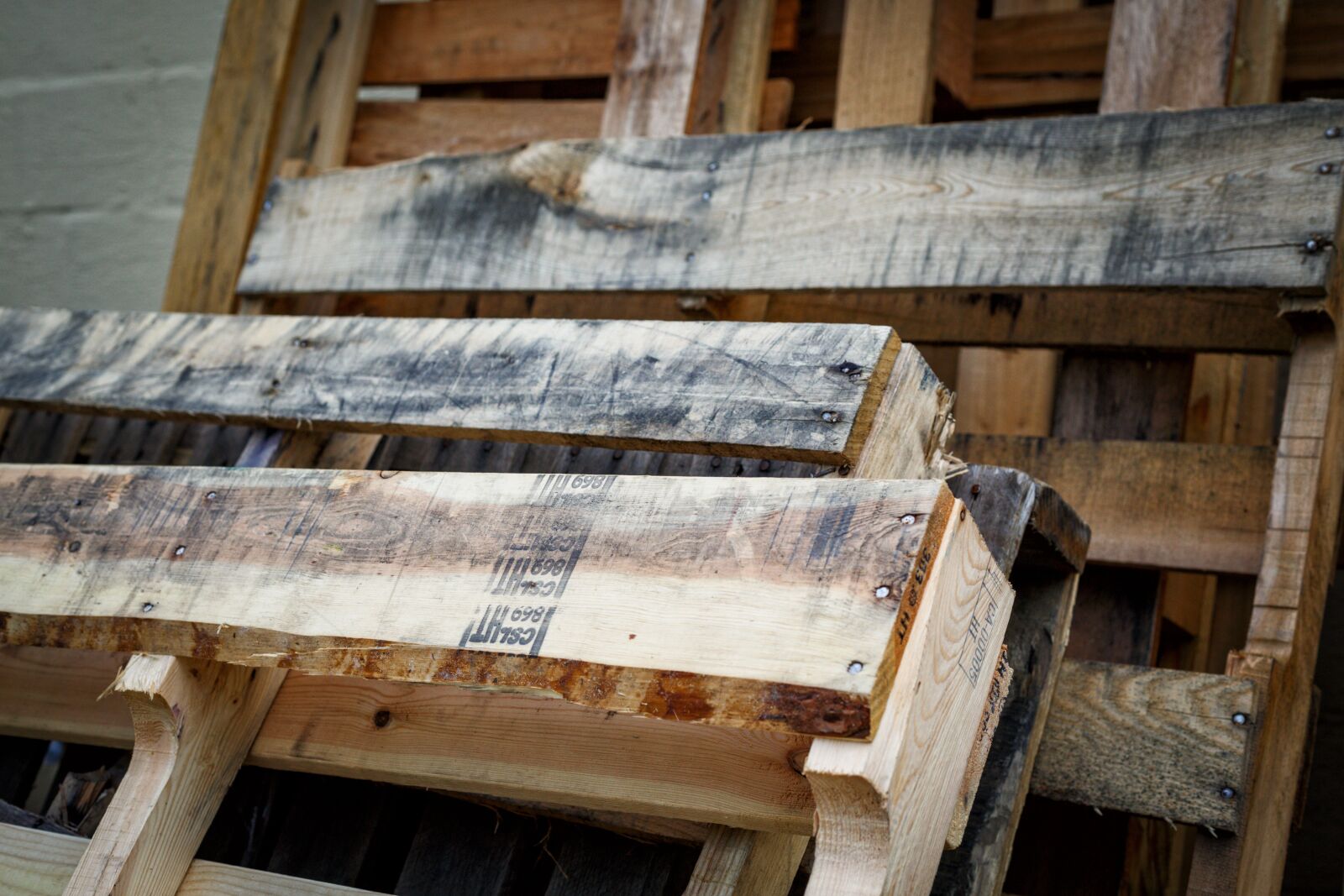 Canon EF 50mm F1.8 II sample photo. Pallets, wood, stacked photography
