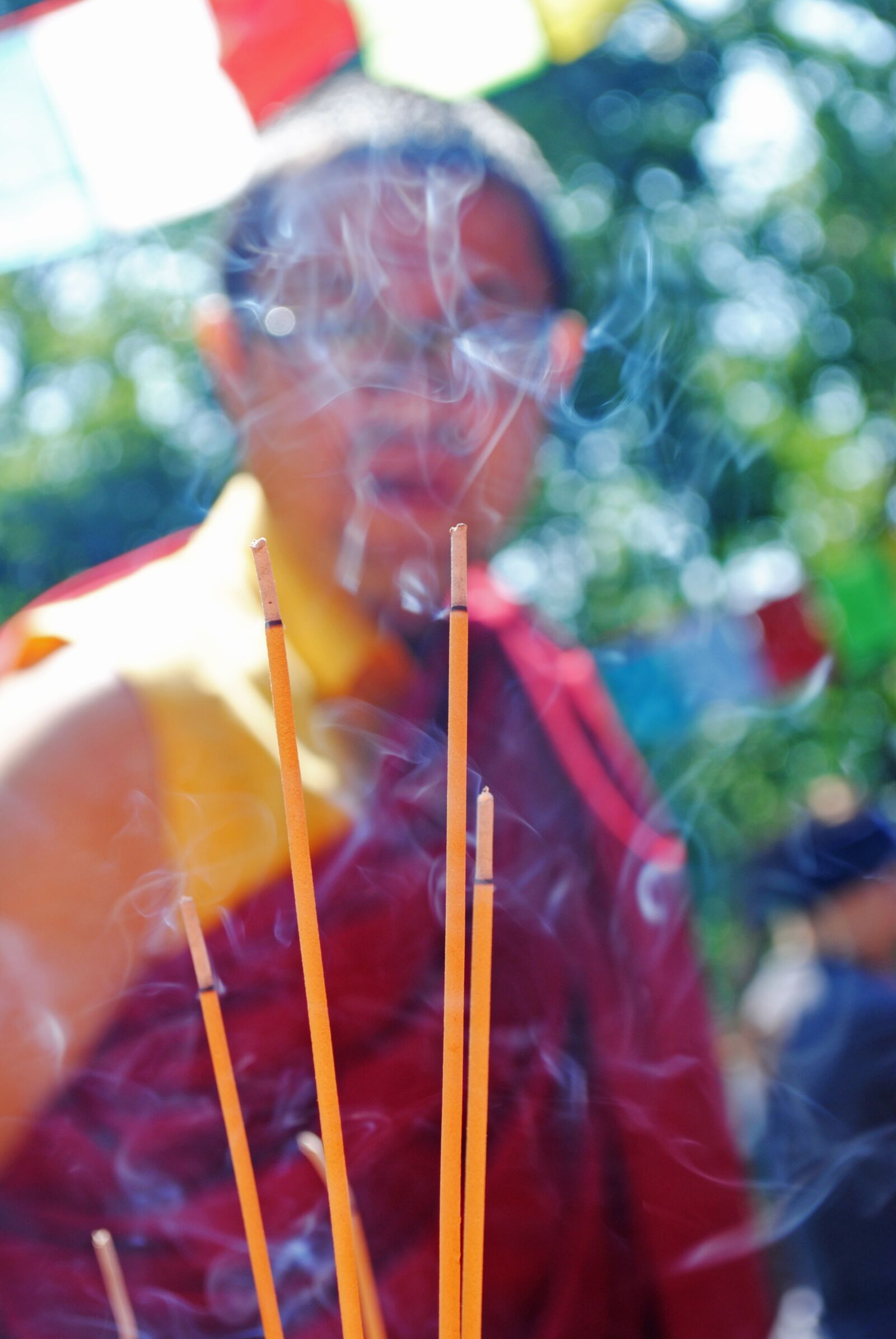 Nikon D3000 sample photo. Buddhist, incense, monk photography
