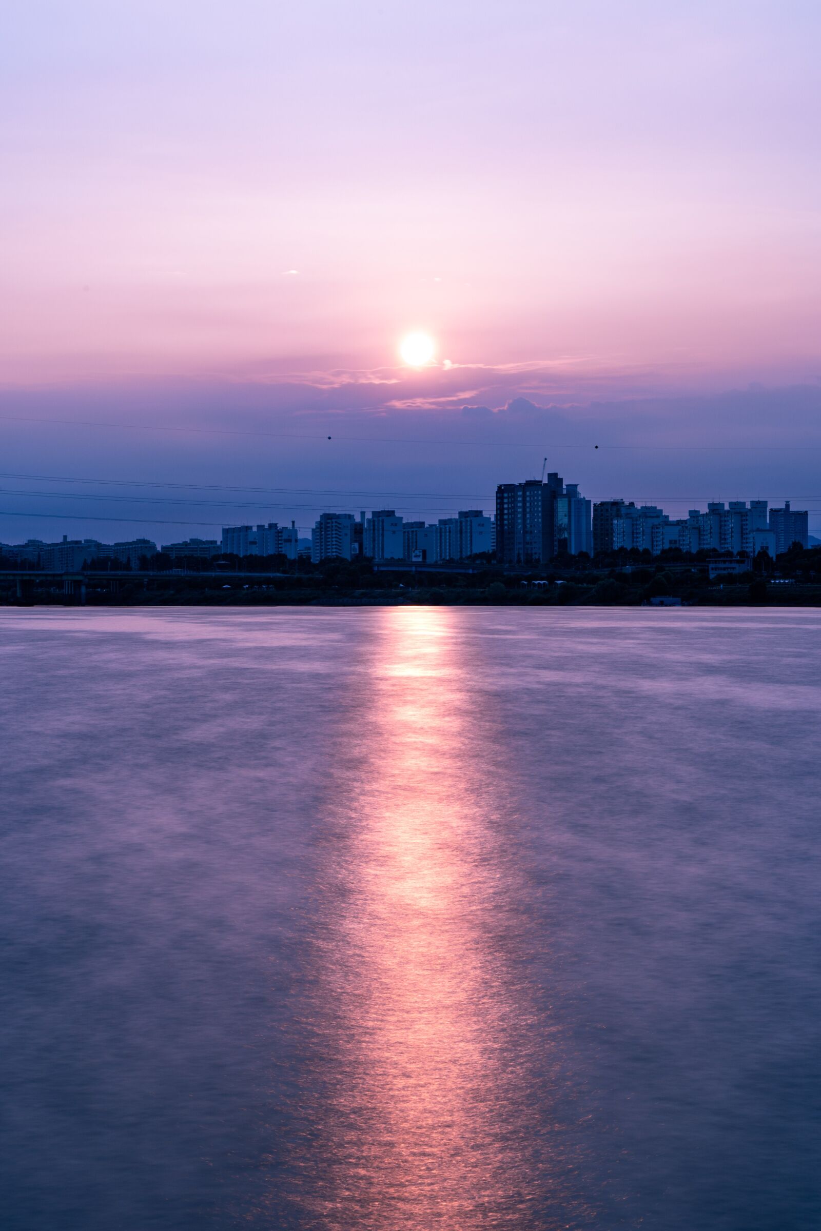Sony a7 III sample photo. Sunrise, river, city photography