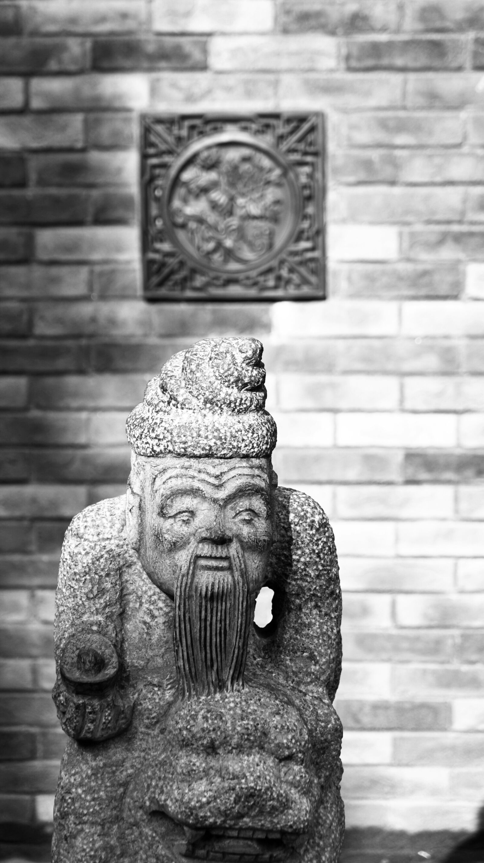 Sony Alpha DSLR-A290 sample photo. Stone, statue, black and photography