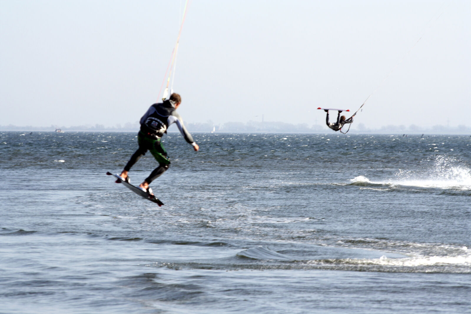 Canon EOS 1000D (EOS Digital Rebel XS / EOS Kiss F) sample photo. Baltic, sea, double, jump photography