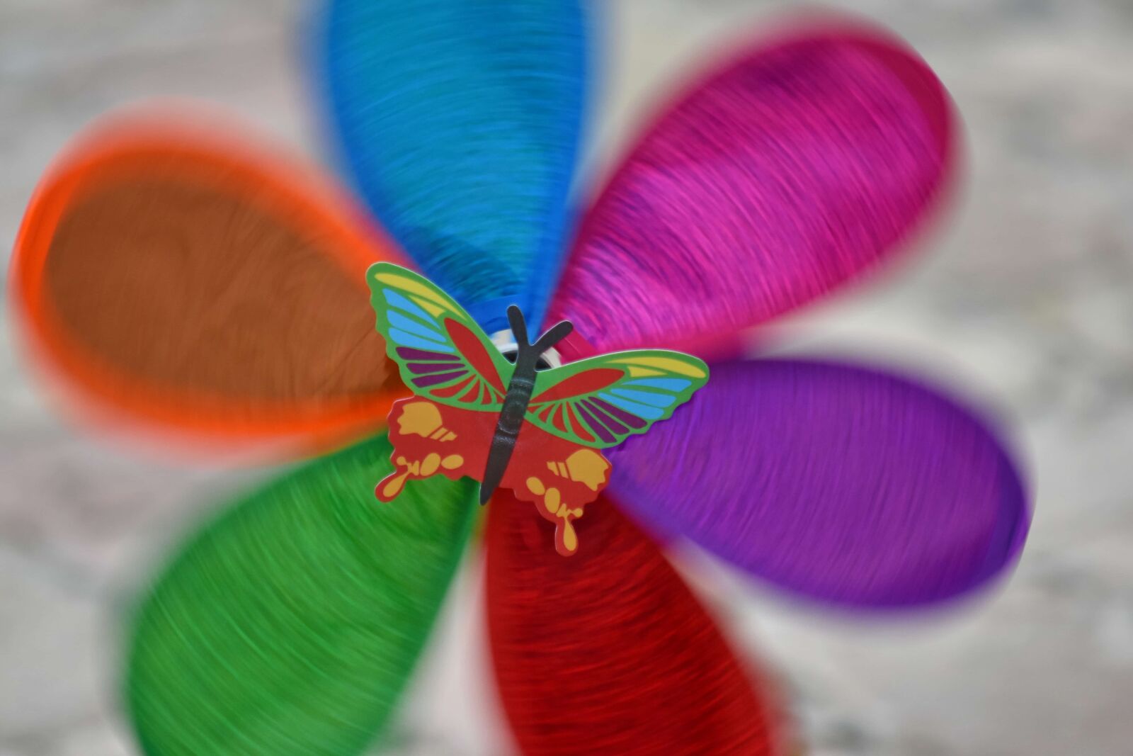 Nikon D5500 sample photo. Butterfly, colorful, toy, wind photography