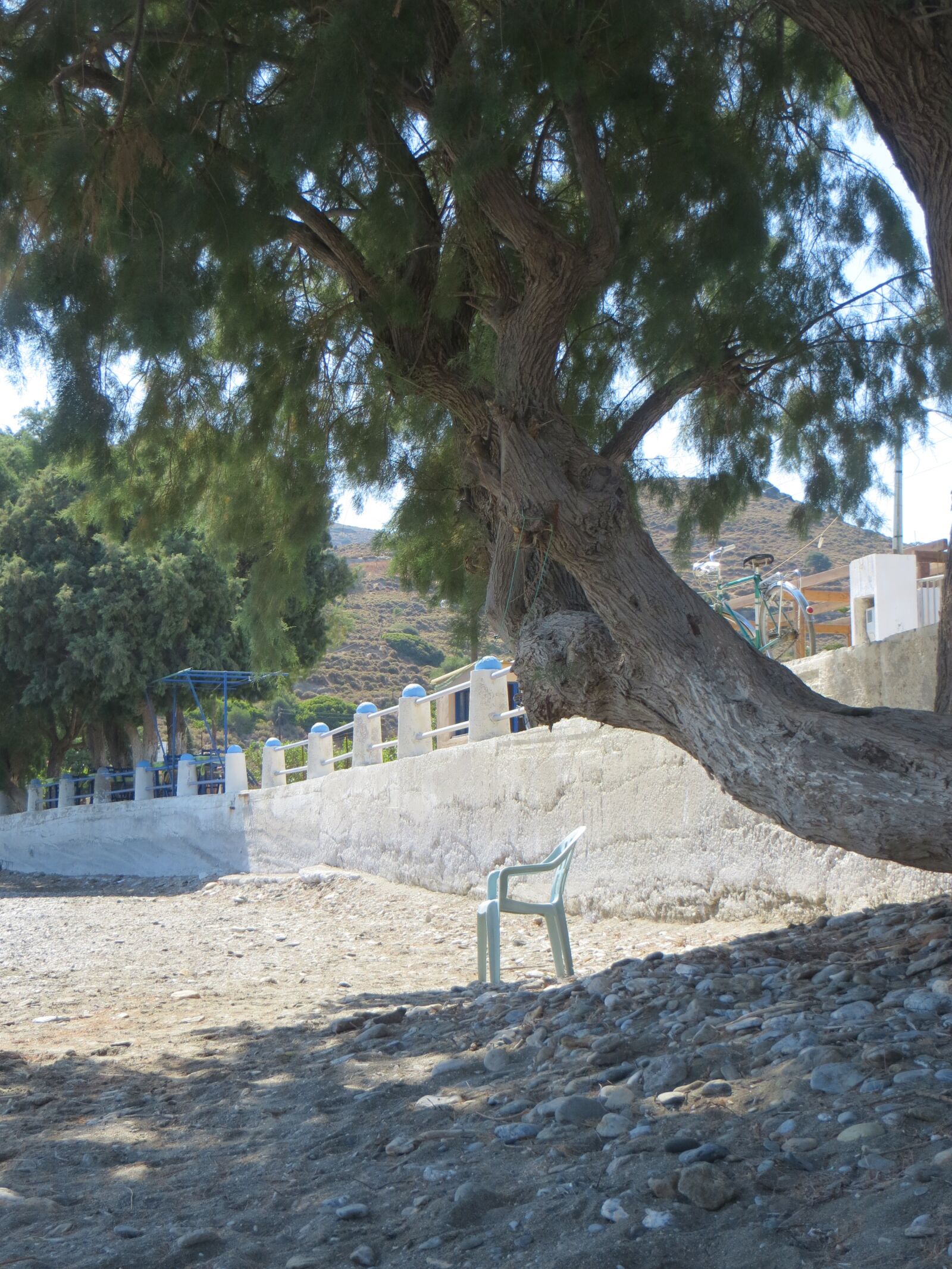 Canon PowerShot SX260 HS sample photo. Leros, beach, chair photography