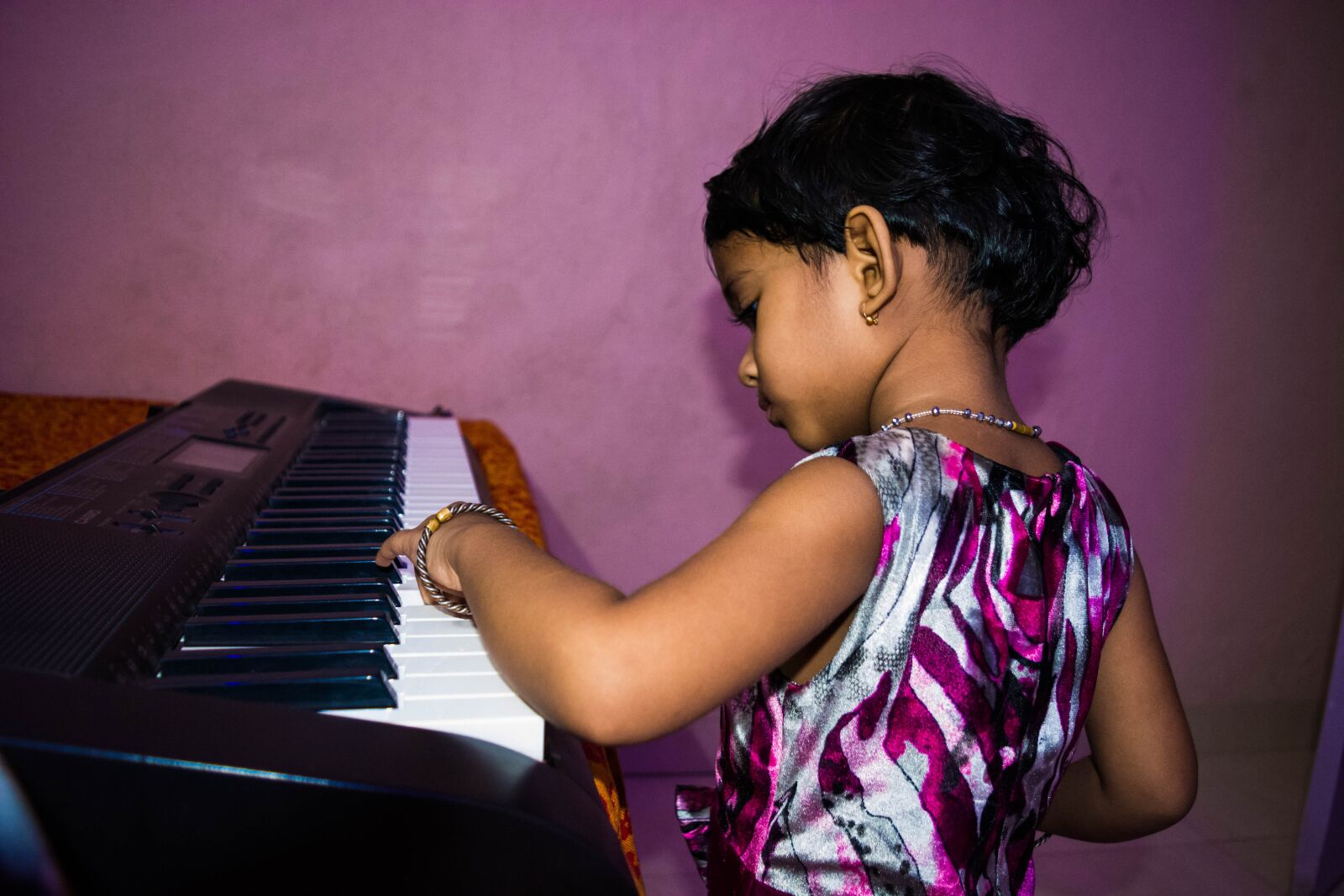 Nikon D5200 sample photo. Cute girl playing piano photography
