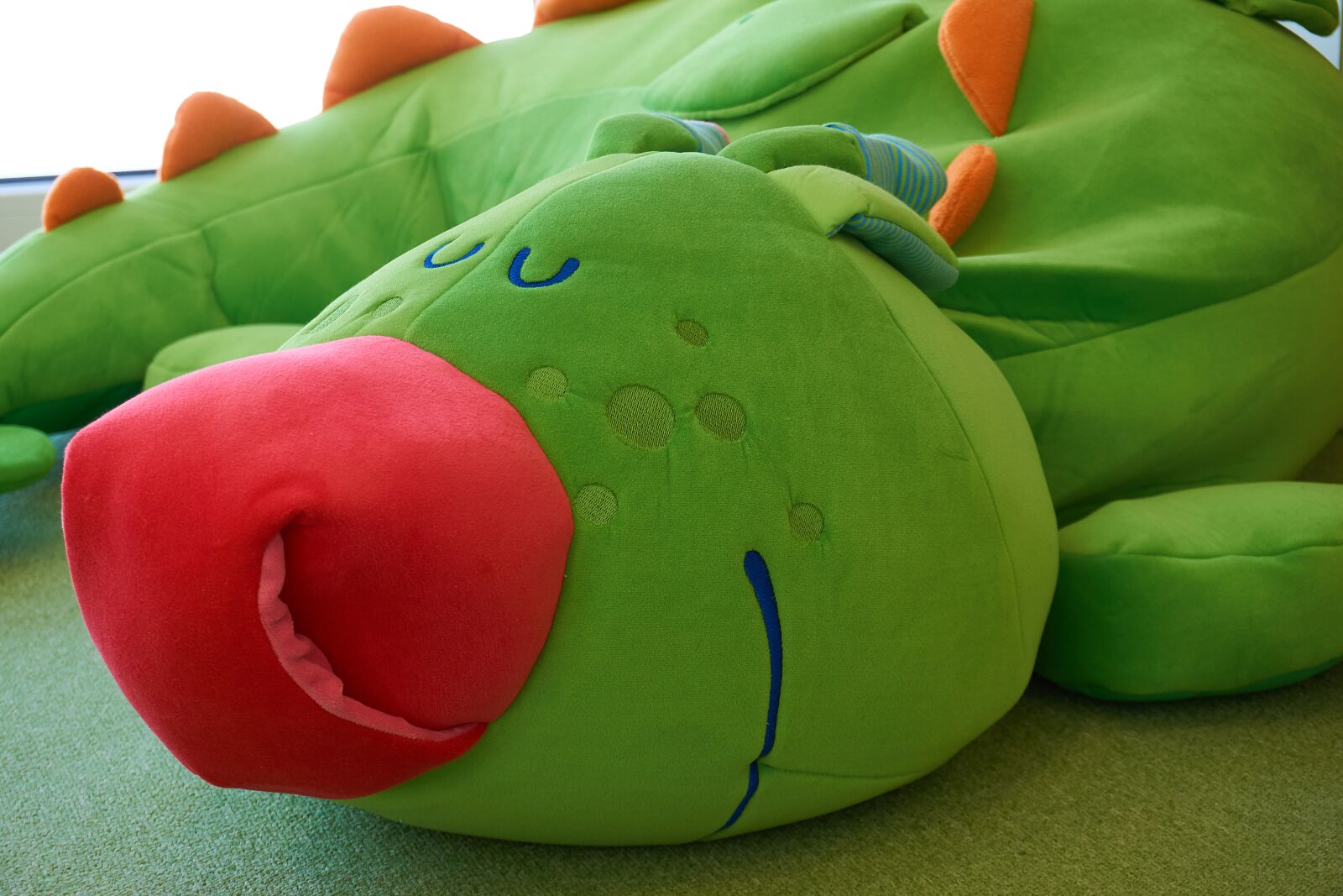 Sony a6000 sample photo. Stuffed animal, dragon, seat photography