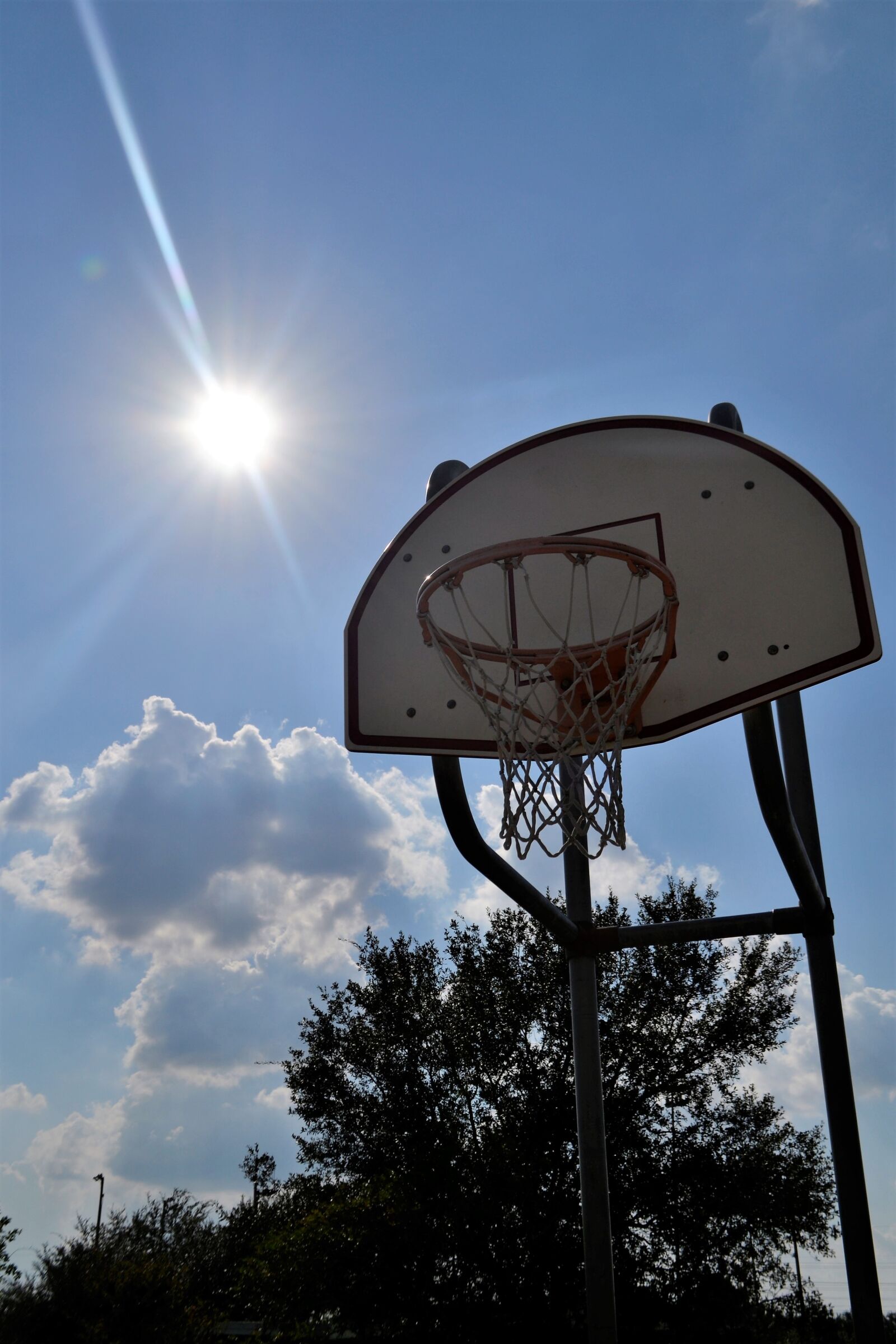 Nikon D3100 sample photo. Outdoor basketball court, sunny photography