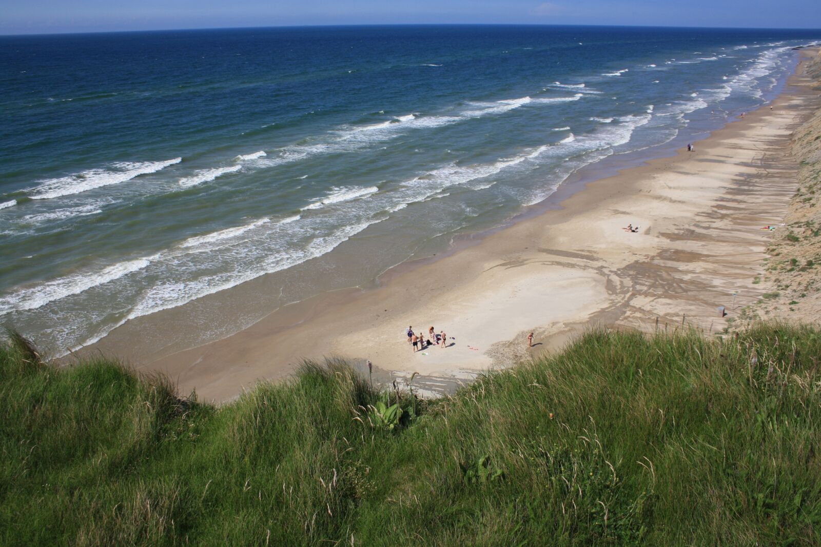 Canon EOS 1000D (EOS Digital Rebel XS / EOS Kiss F) sample photo. Denmark, cliff, human photography